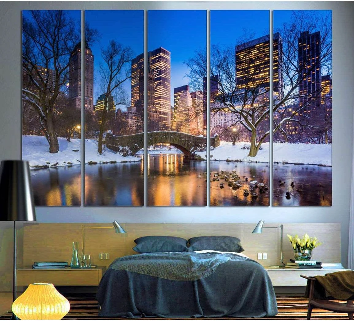 Five-panel Central Park canvas print with Gapstow Bridge and NYC skyline above bed