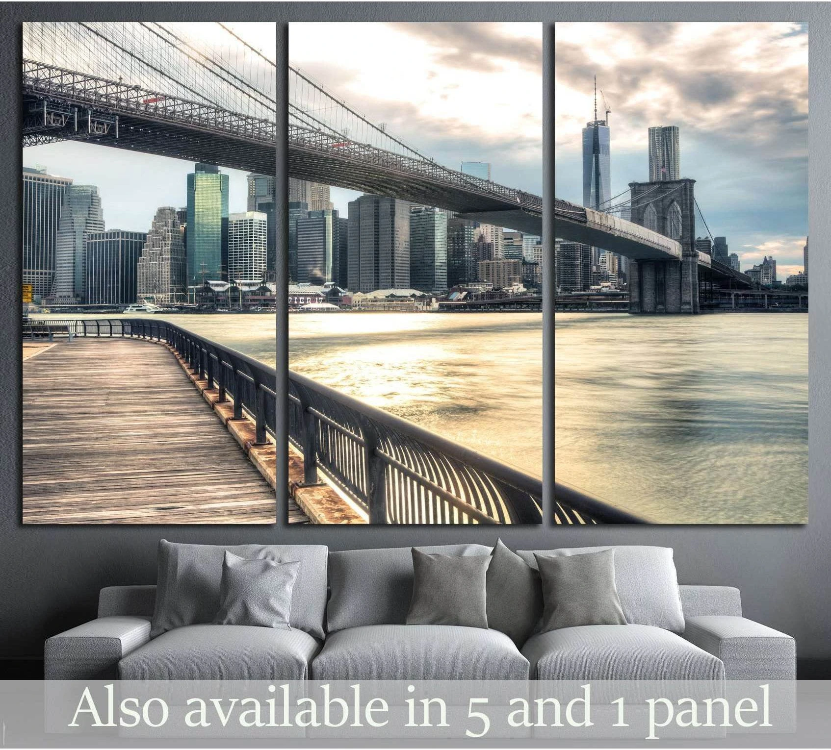 Brooklyn Bridge canvas print with Manhattan skyline and river view, displayed above sofa in modern living room