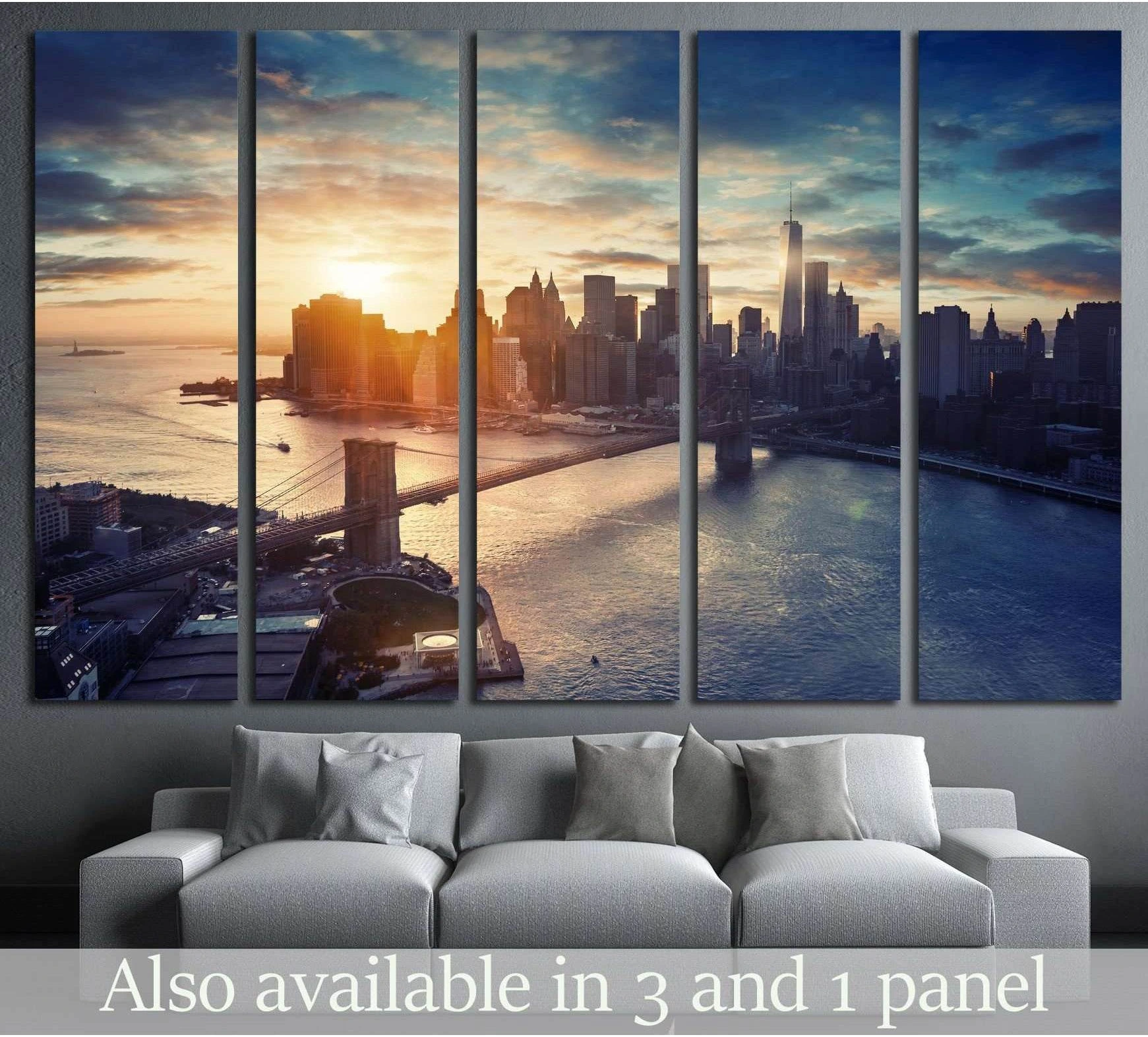 Manhattan skyline sunset canvas print in five panels above a sofa in a modern living room