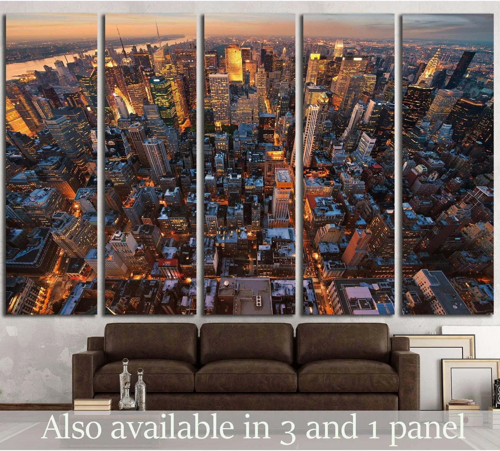 Aerial New York City skyline sunset canvas print hung above sofa in a modern living room
