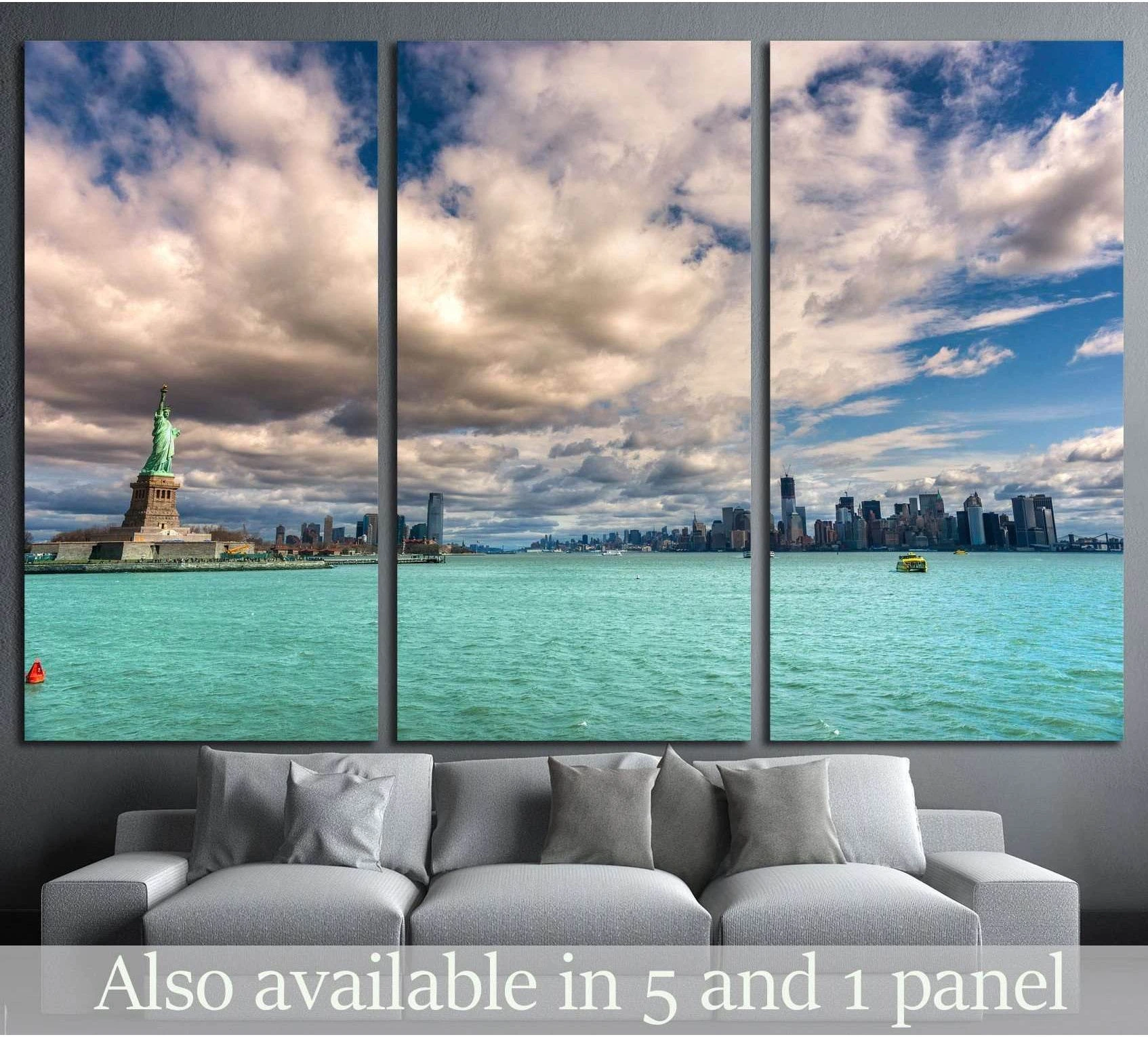 NYC skyline and Statue of Liberty triptych canvas print above sofa with turquoise harbor