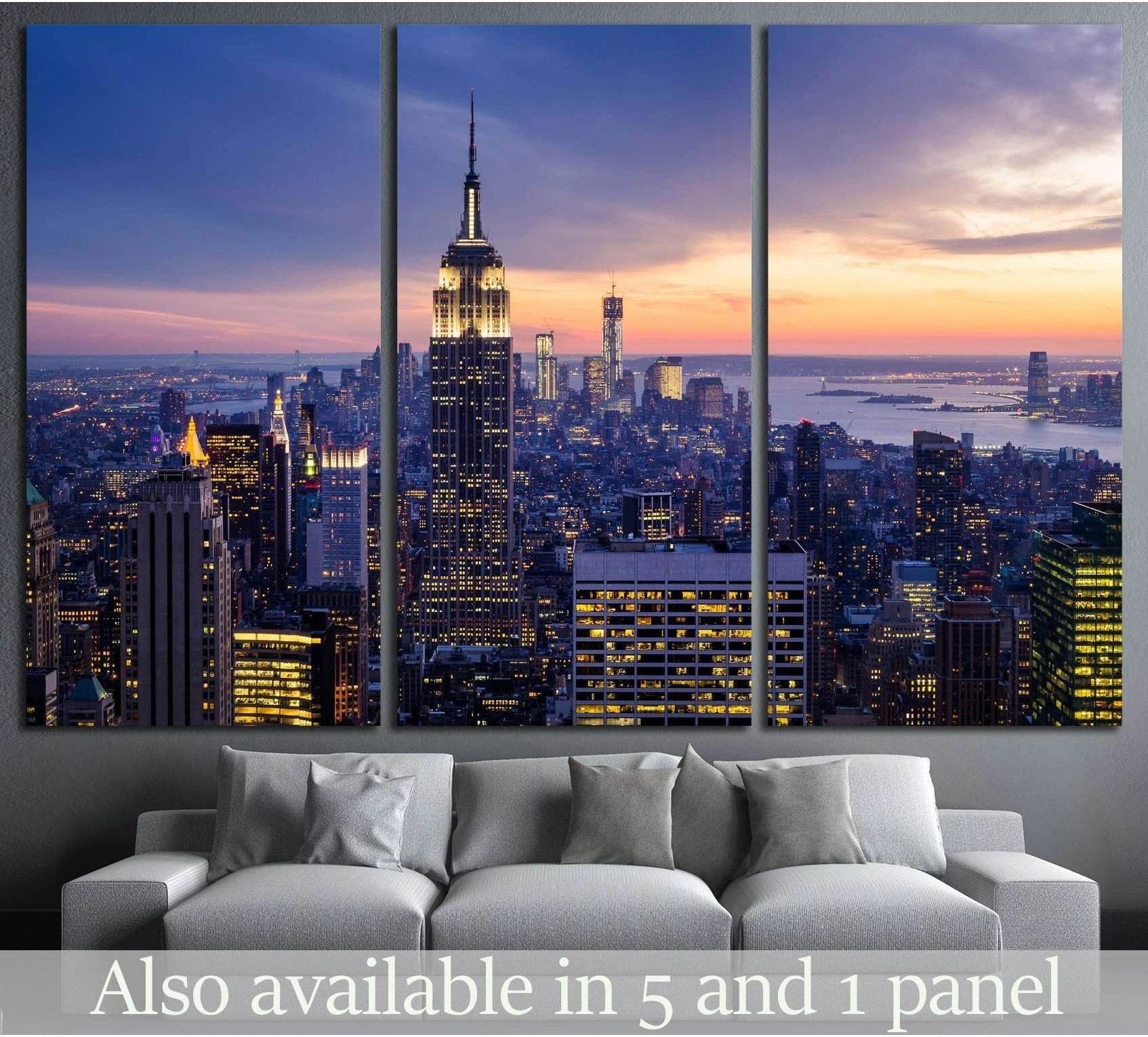 New York City sunset skyline triptych canvas print with Empire State Building above sofa