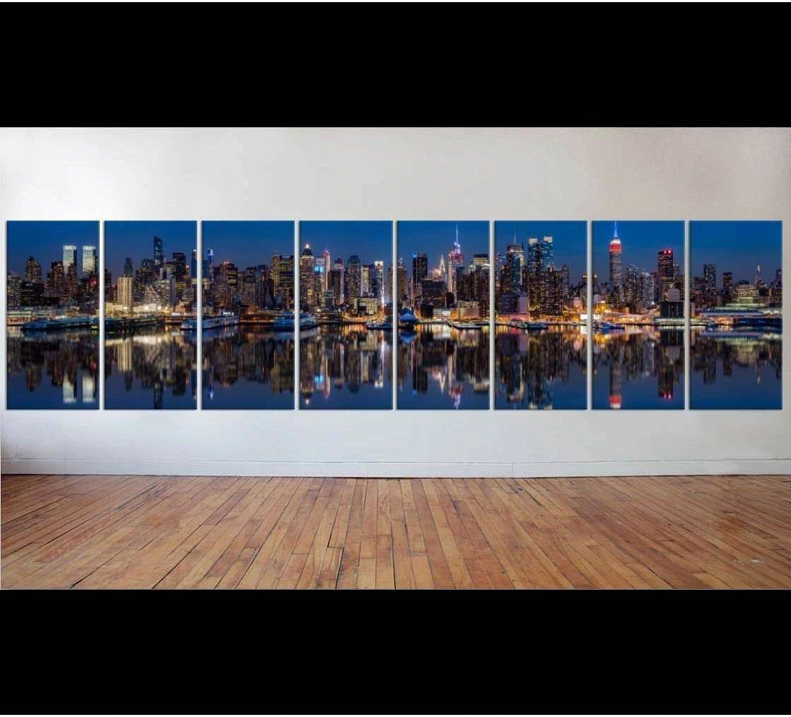 Multi-panel NYC skyline canvas print with Manhattan at night and waterfront reflections
