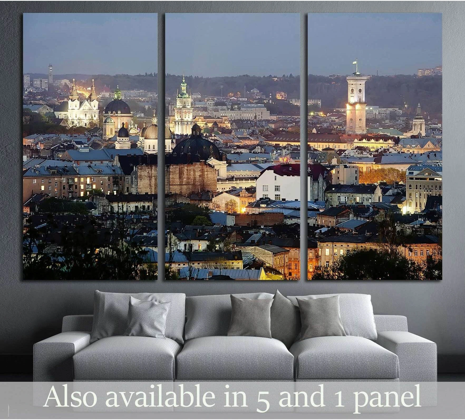 Lviv skyline triptych canvas print above sofa with church domes and old town lights at dusk