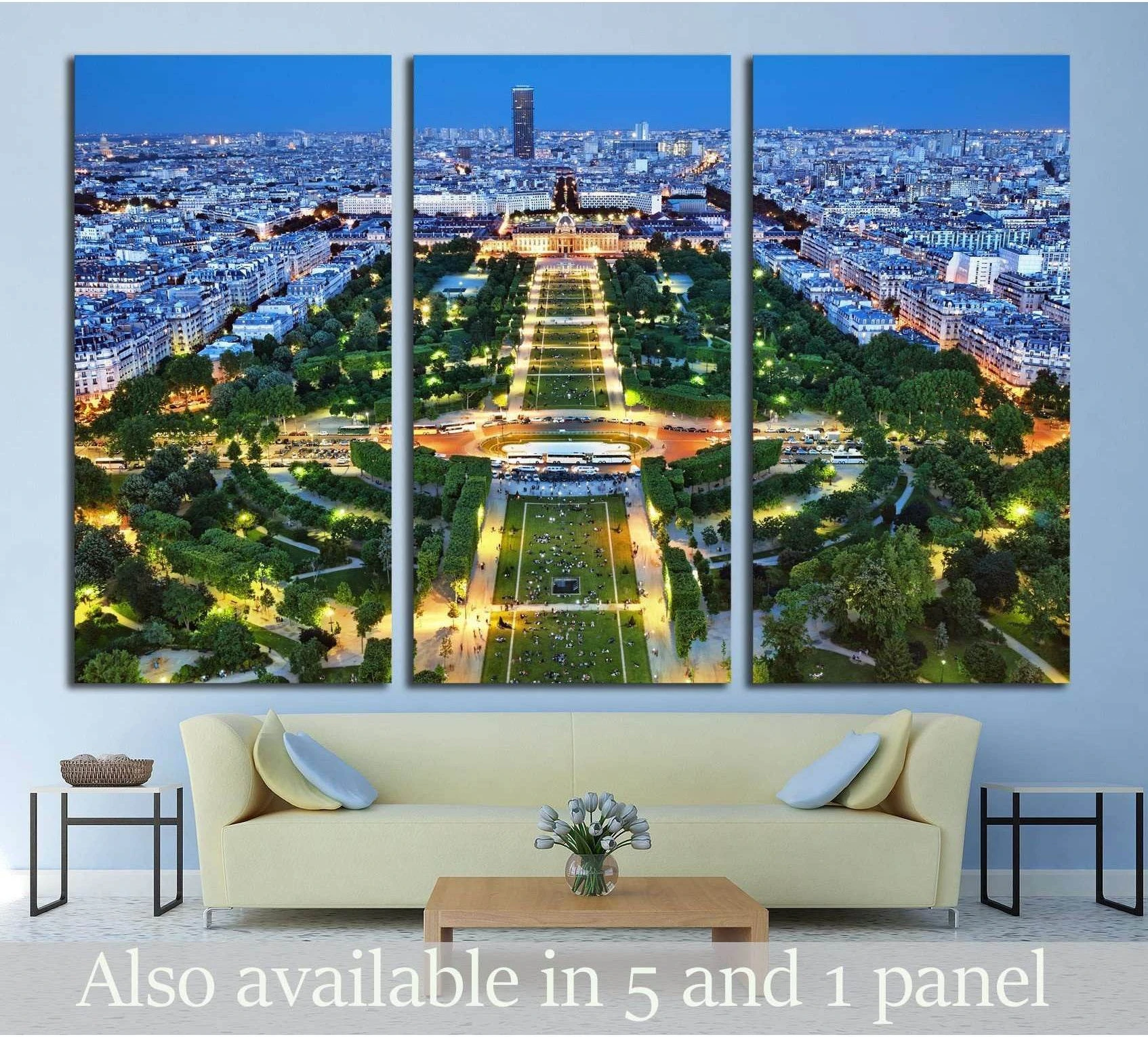 Paris night view triptych canvas print over Champ de Mars above a sofa in a modern living room