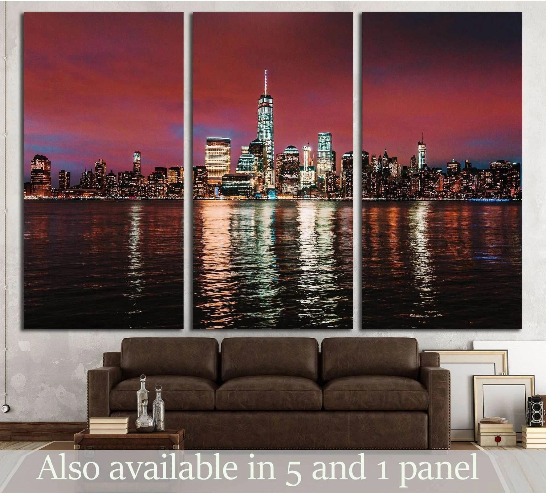 NYC skyline triptych canvas print with red dusk sky and river reflections above a brown sofa