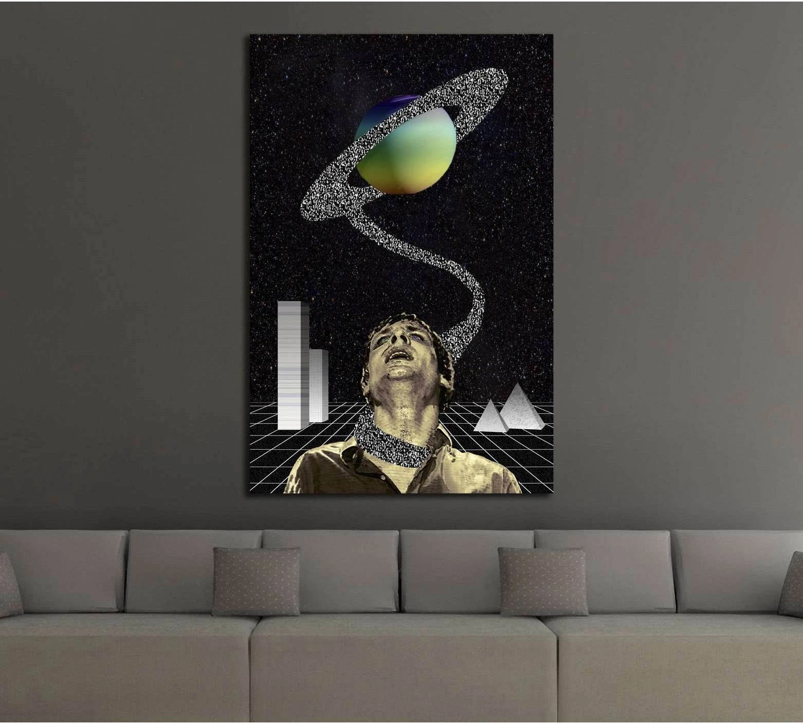 Surreal space collage canvas print with Saturn and sepia portrait above a sofa in a modern living room