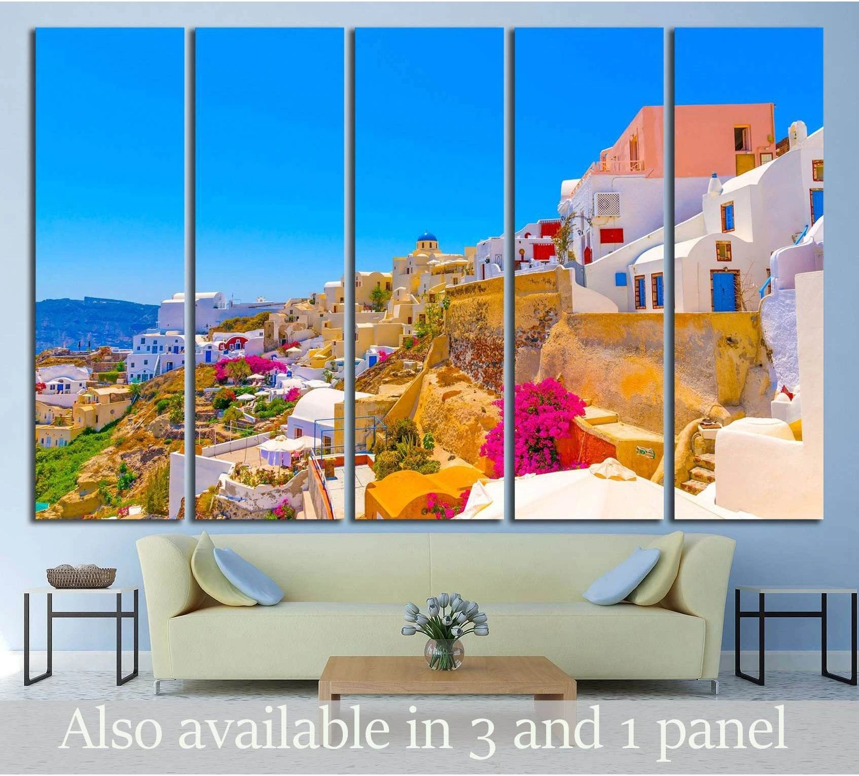 Oia Santorini canvas print with white cliffside homes and pink bougainvillea above a beige sofa