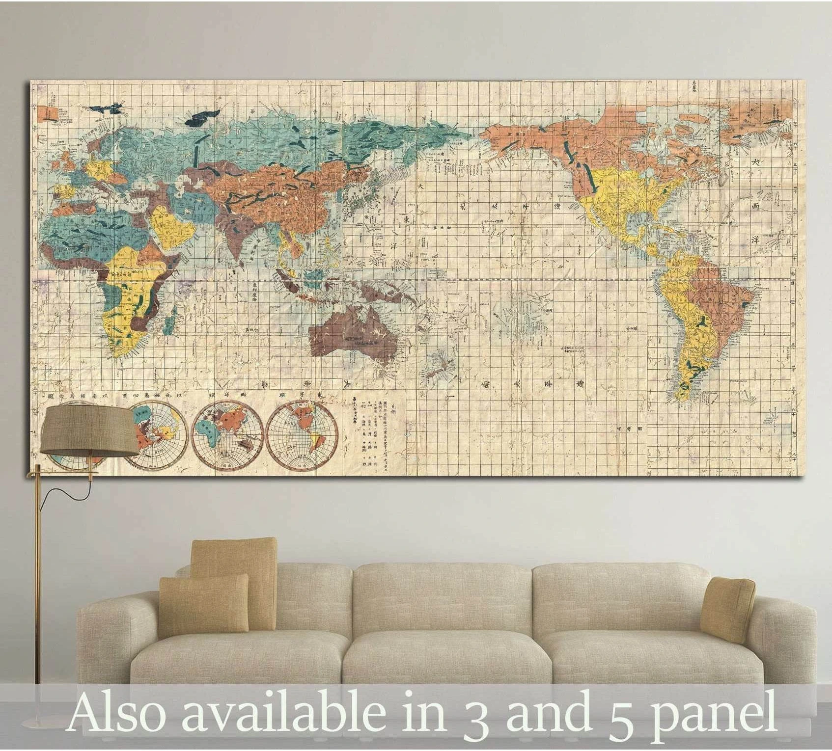 Vintage world map canvas print in muted teal and rust above a beige sofa in a neutral room