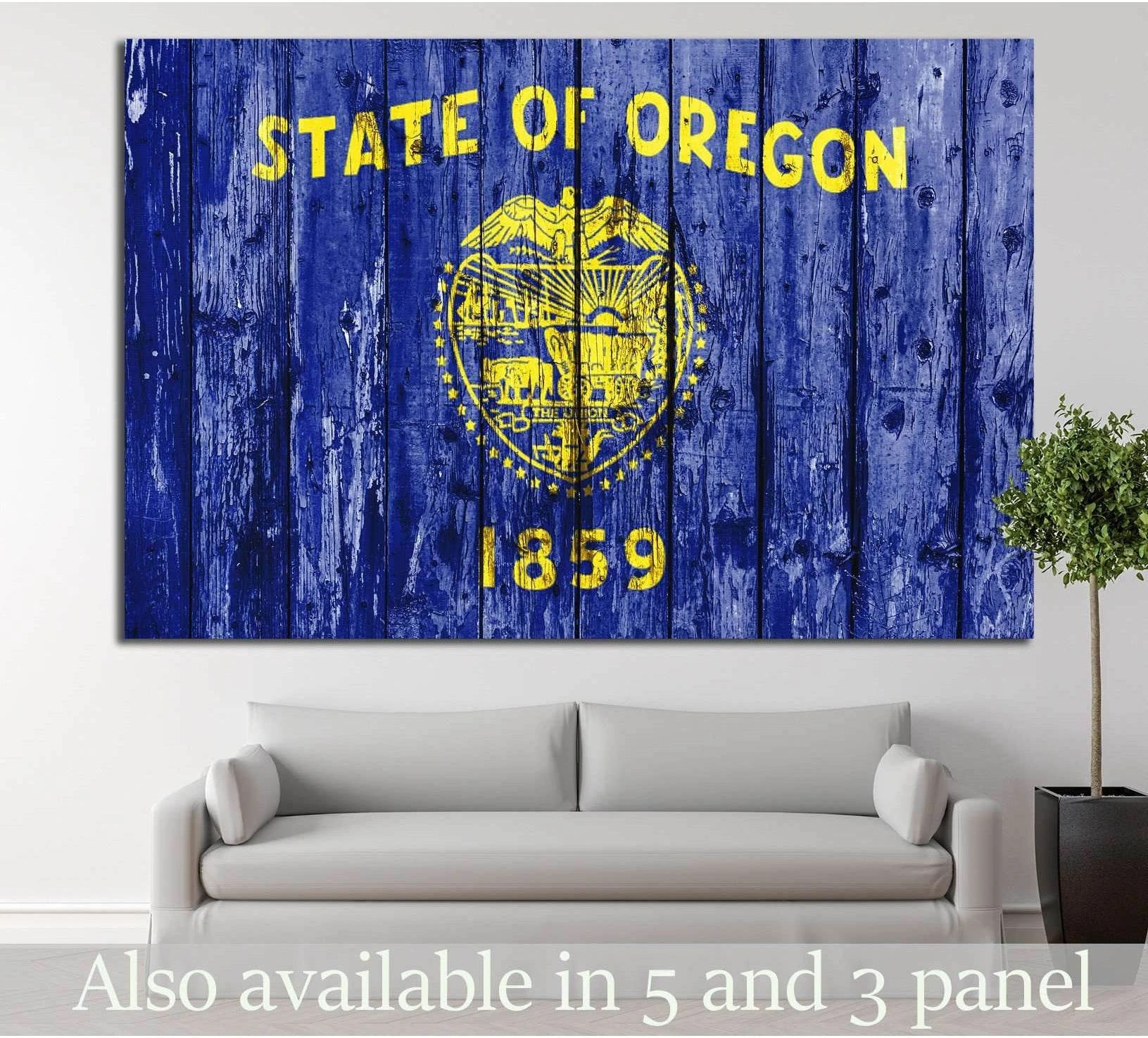 Oregon state flag canvas print on distressed blue wood planks, hung above a sofa in a modern living room