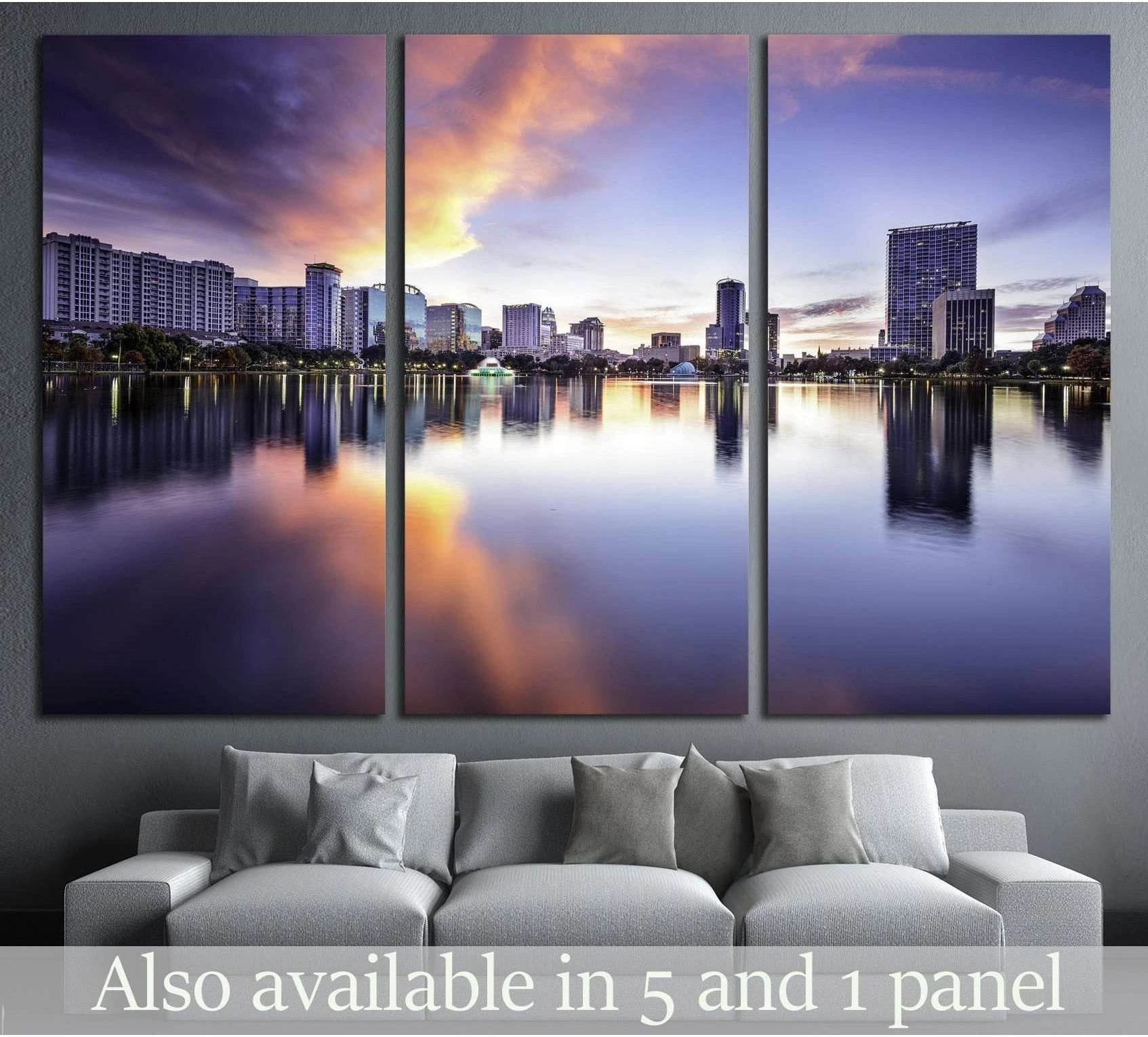 Orlando skyline canvas print at Lake Eola with sunset reflections above a sofa in a modern living room