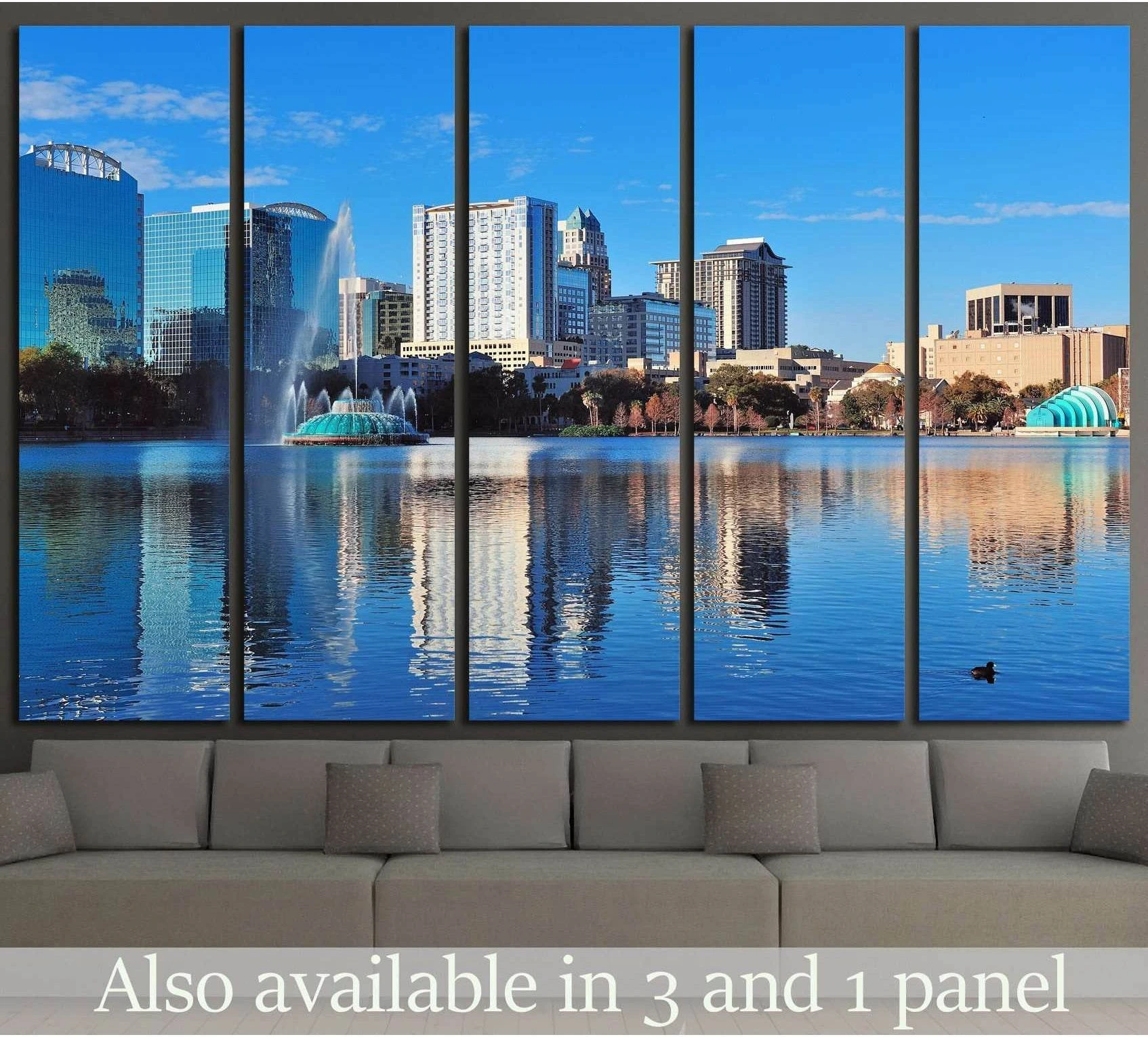Orlando Lake Eola skyline canvas print with fountain and blue water reflections above sofa