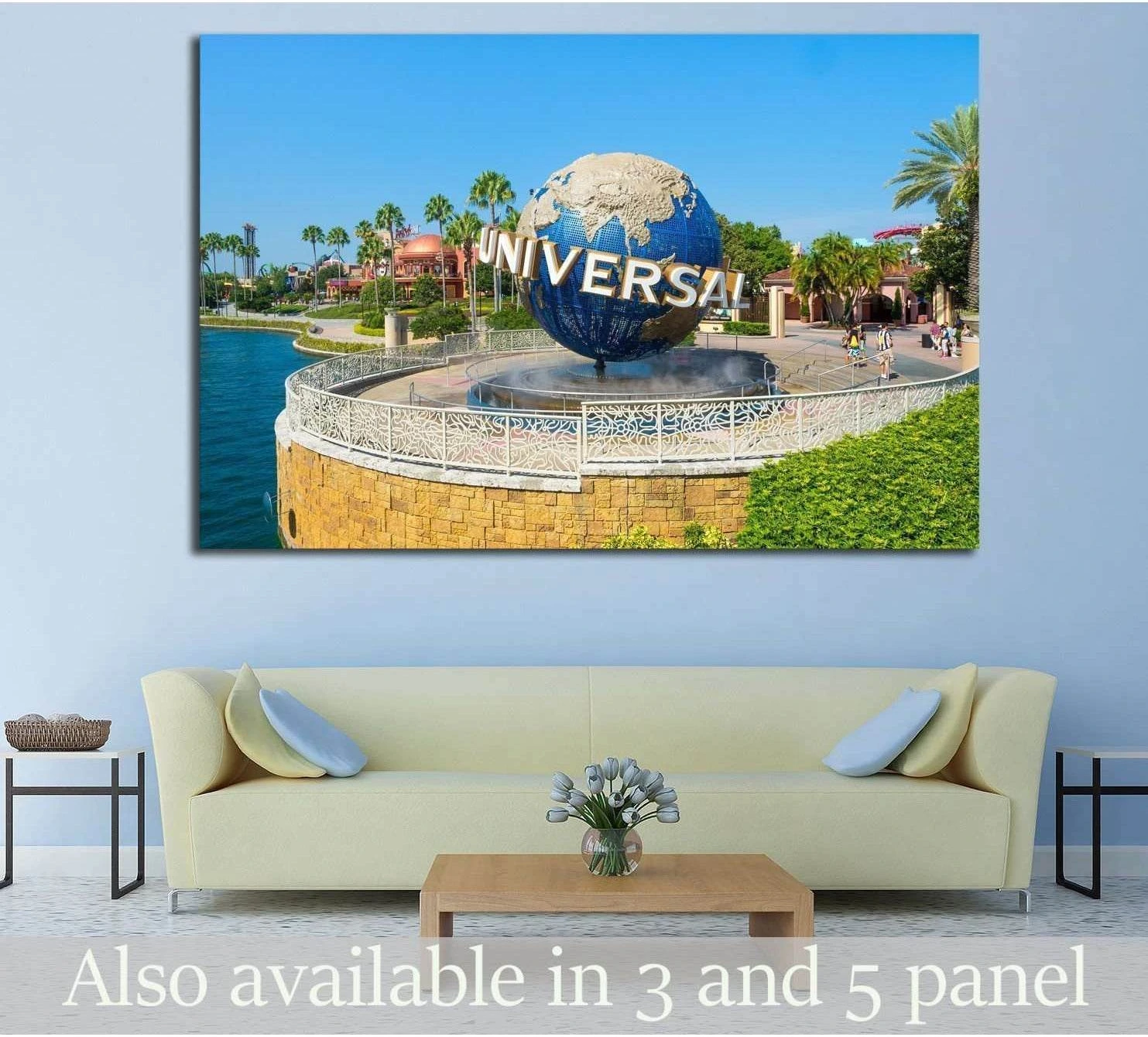 Universal Studios globe canvas print above sofa with blue sky, palms, and fountain in Orlando