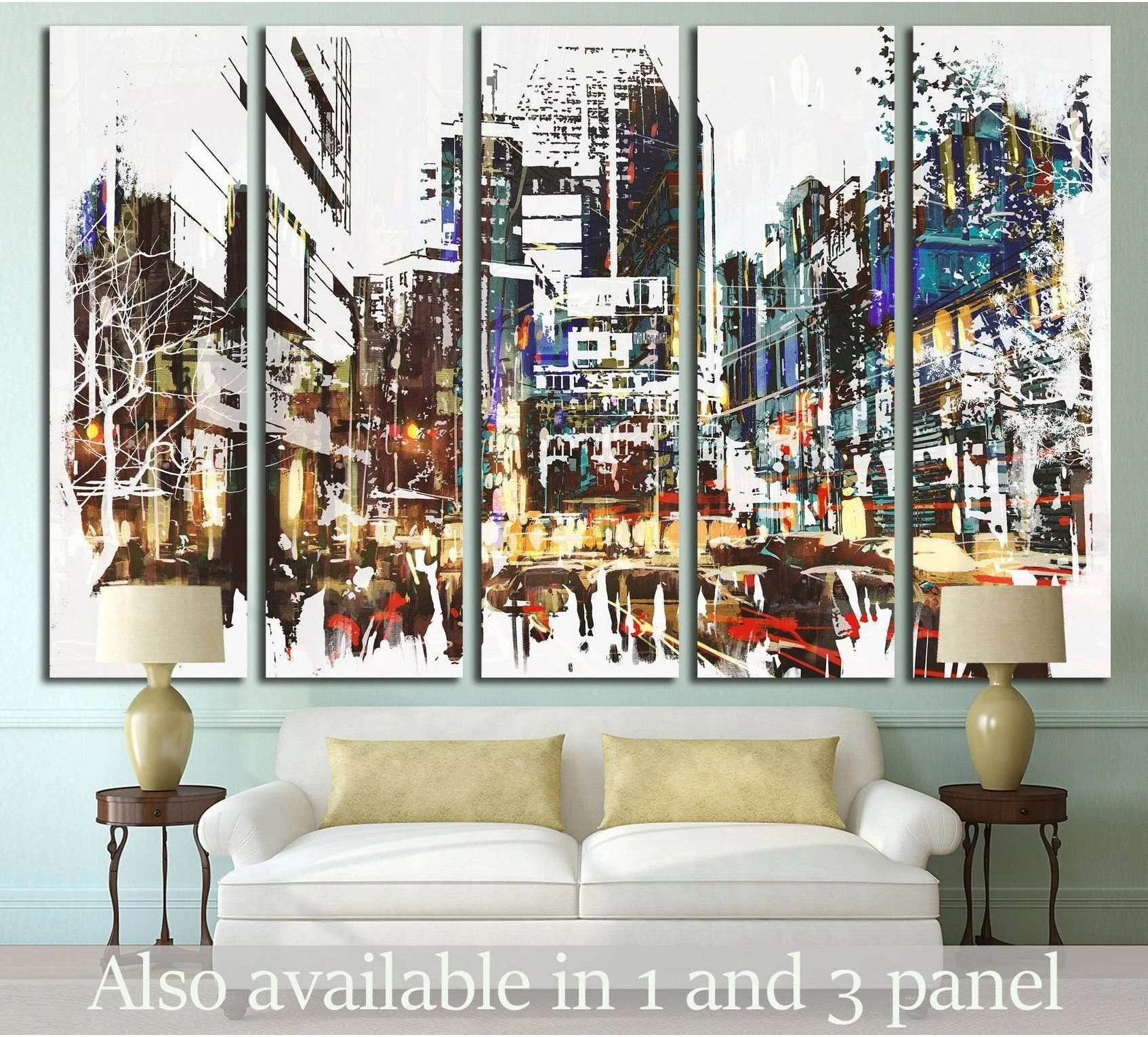 Abstract city street canvas print with tall buildings, lights, and pedestrians above a sofa