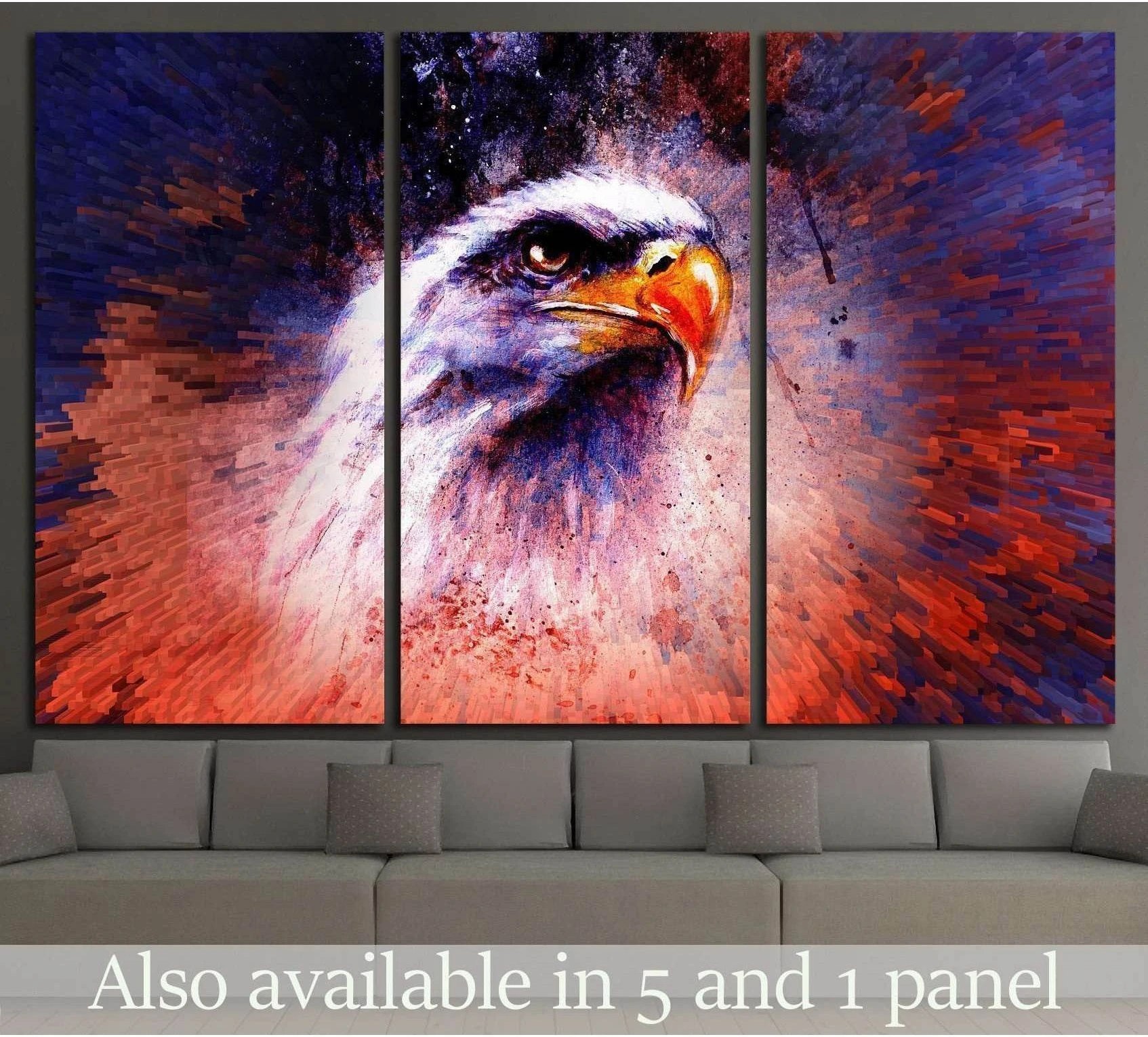 Abstract eagle triptych canvas print with purple, blue, and orange brushstrokes above a gray sofa