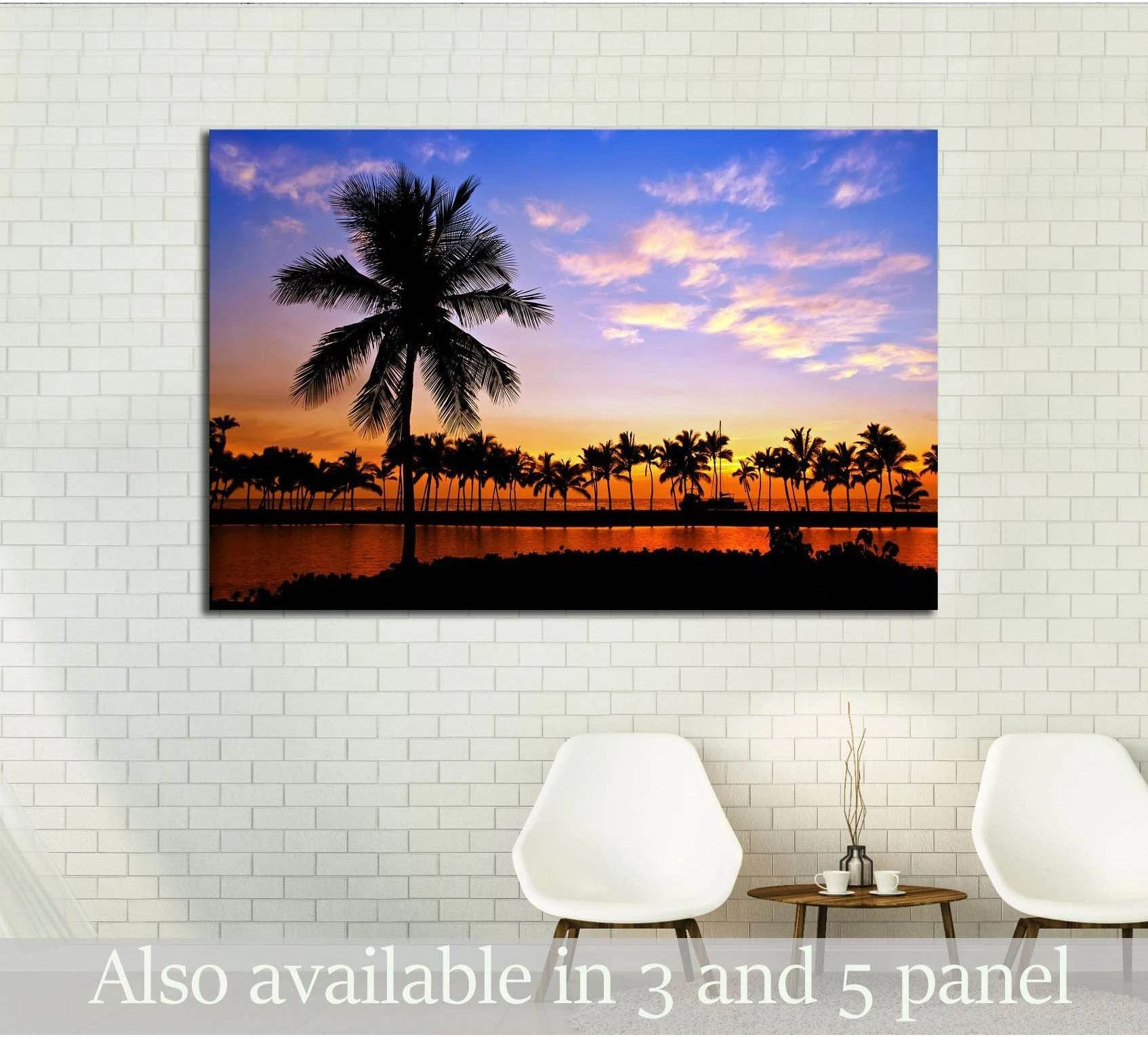 Hawaii palm tree sunset canvas print with black silhouettes above chairs in a modern room