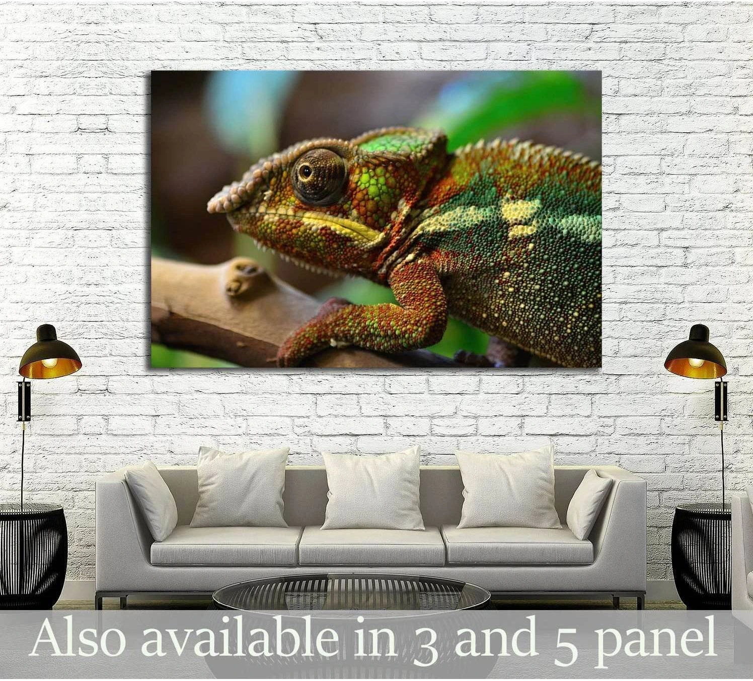 Panther chameleon canvas print in close-up on a branch, displayed above a sofa in a modern living room