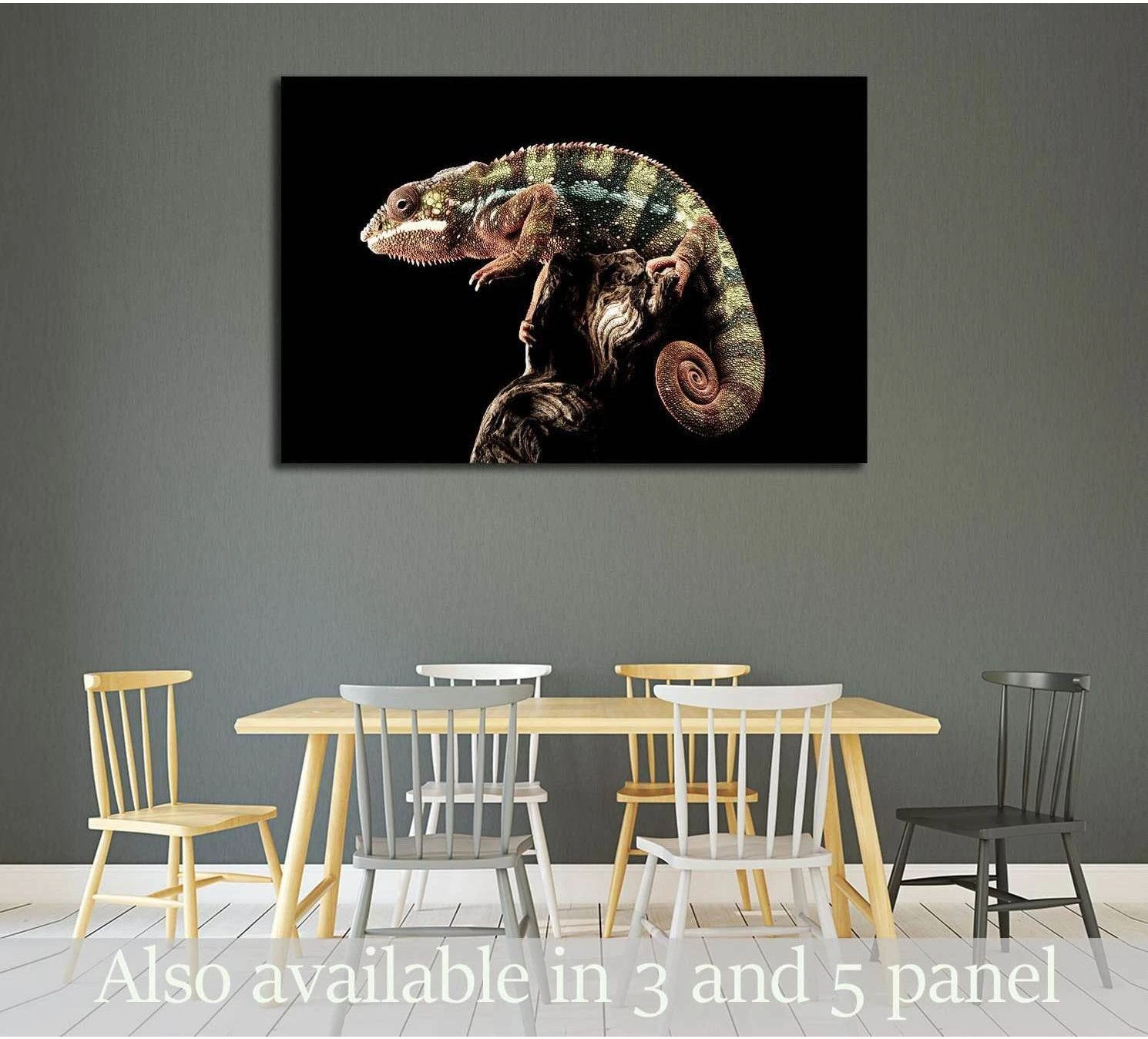 Panther chameleon canvas print on black background displayed above a dining table in a modern room