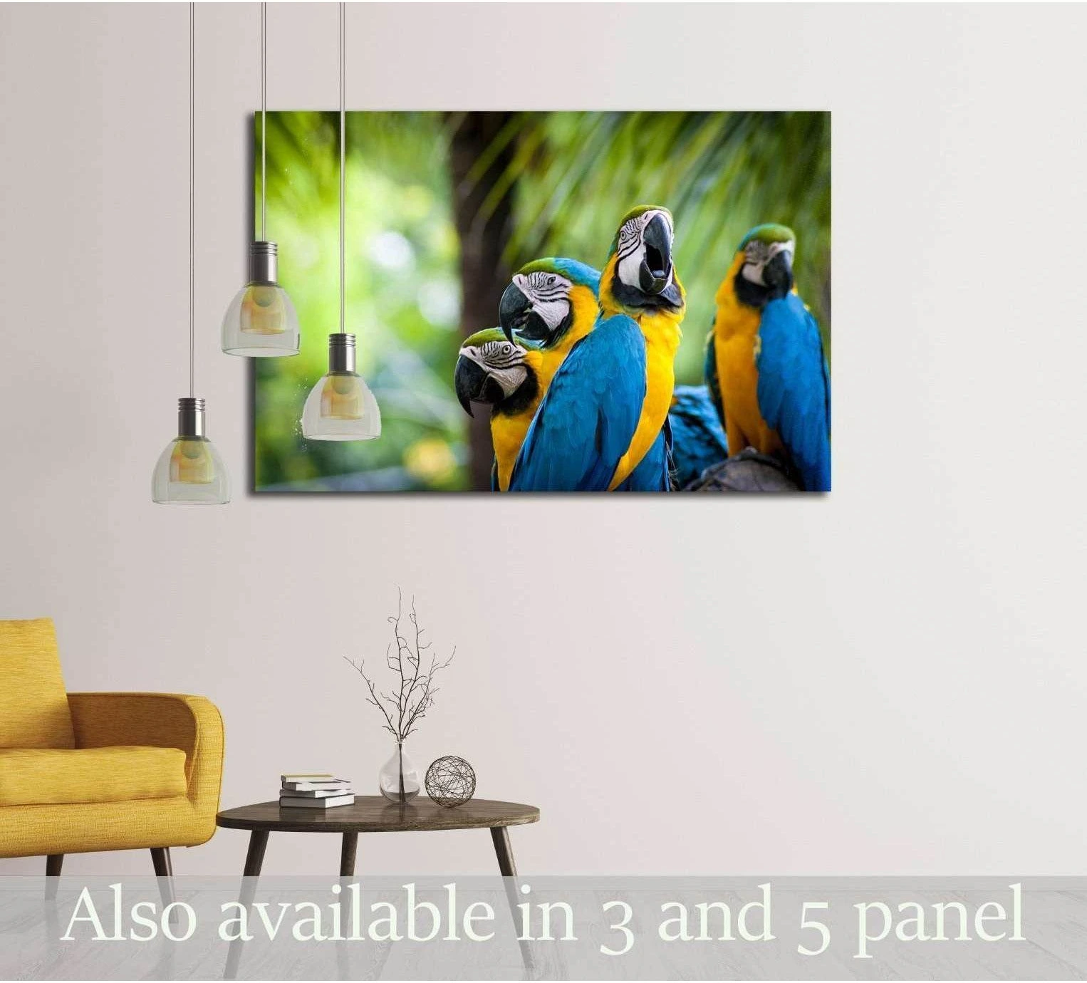 Blue and yellow macaw canvas print with three parrots in tropical foliage above a side table
