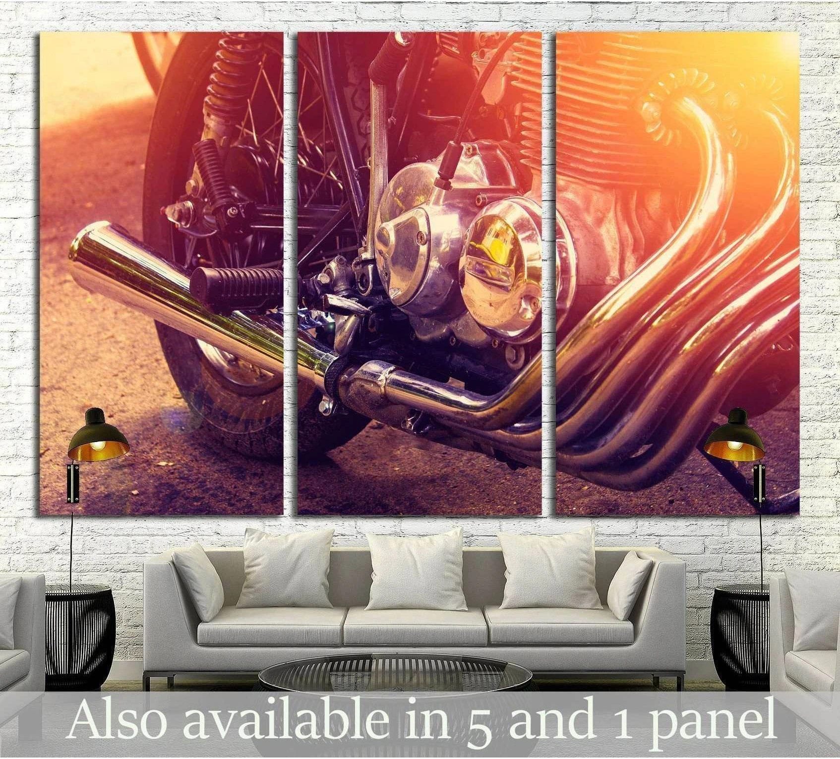 Vintage motorcycle engine and chrome exhaust canvas print hung above sofa in modern living room