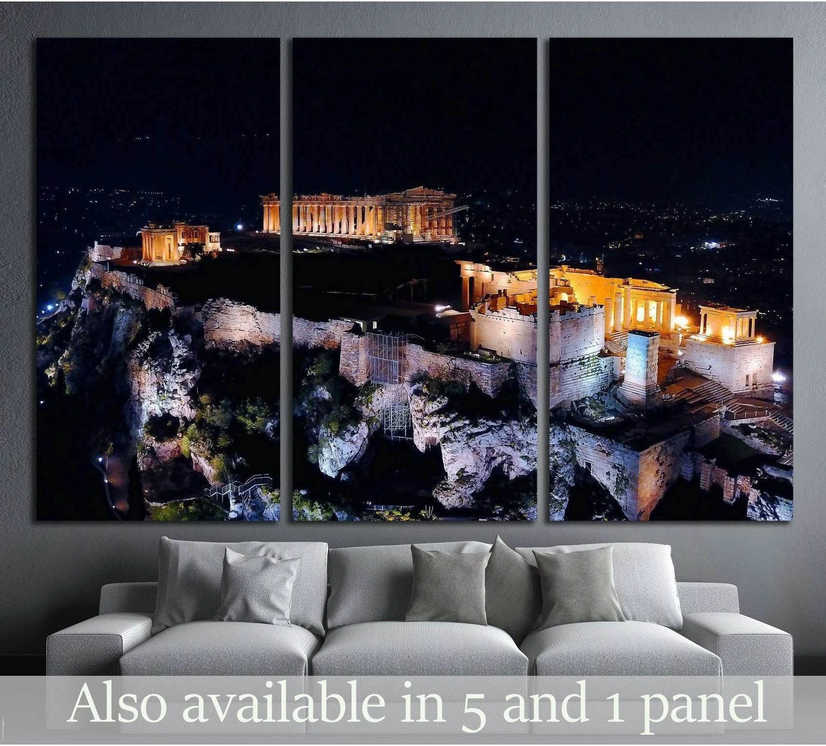 Athens Acropolis night canvas print with the illuminated Parthenon and Propylaia hung above a gray sofa