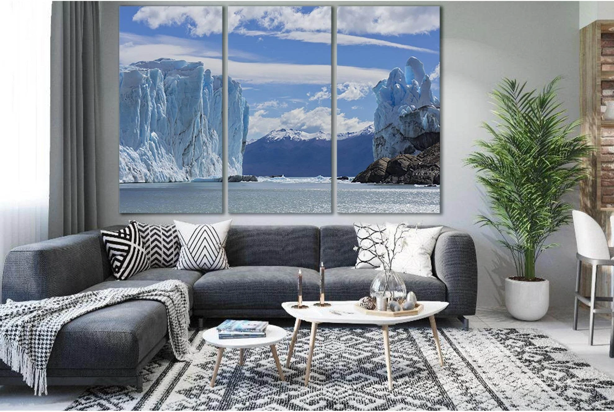 Triptych Perito Moreno glacier canvas print above sofa in a modern living room
