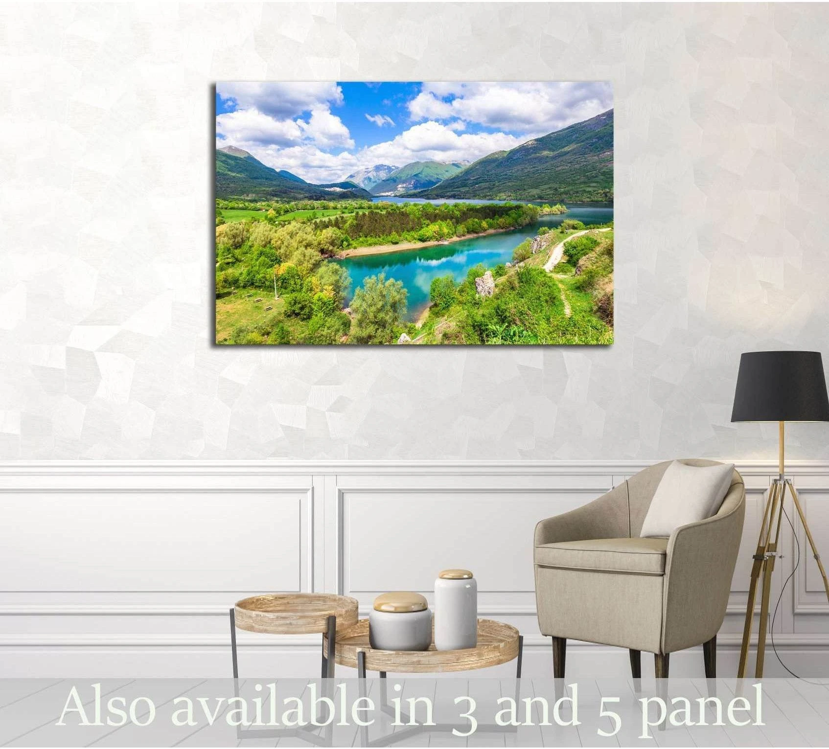Lake Barrea canvas print with turquoise water and mountain valley above chair in neutral living room