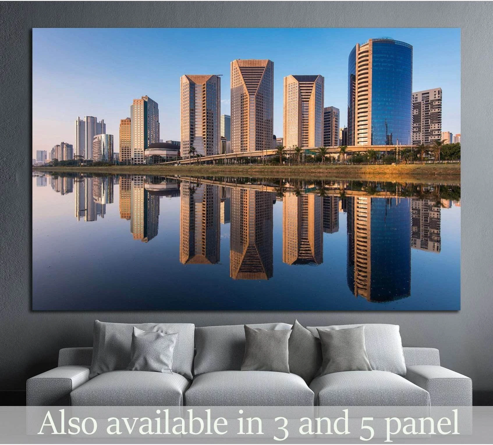 Sao Paulo skyline canvas print with Pinheiros River reflections in warm evening light above a sofa
