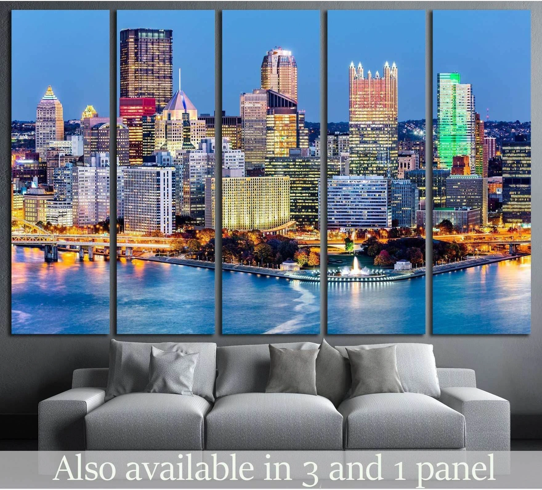 Pittsburgh skyline canvas print over river at dusk above sofa in modern living room