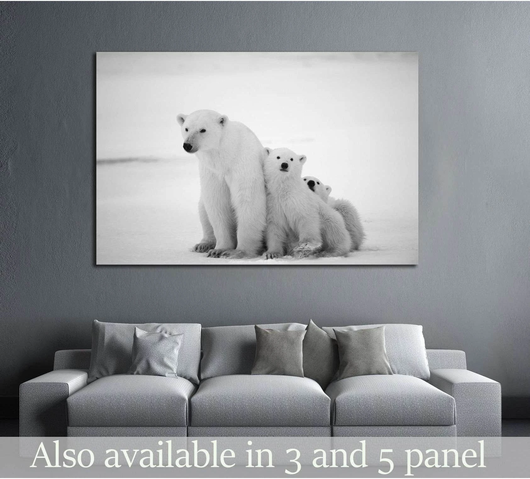 Polar bear family canvas print with mother bear and two cubs above sofa in a modern living room
