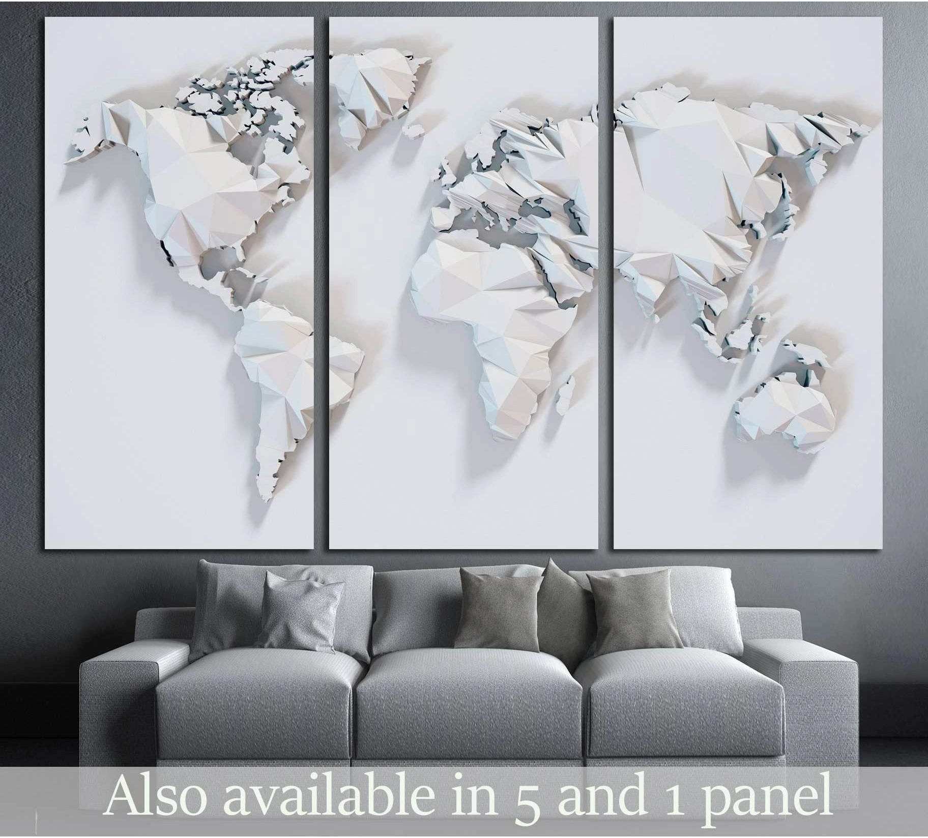 White low-poly world map triptych canvas print displayed above a gray sofa in a modern room