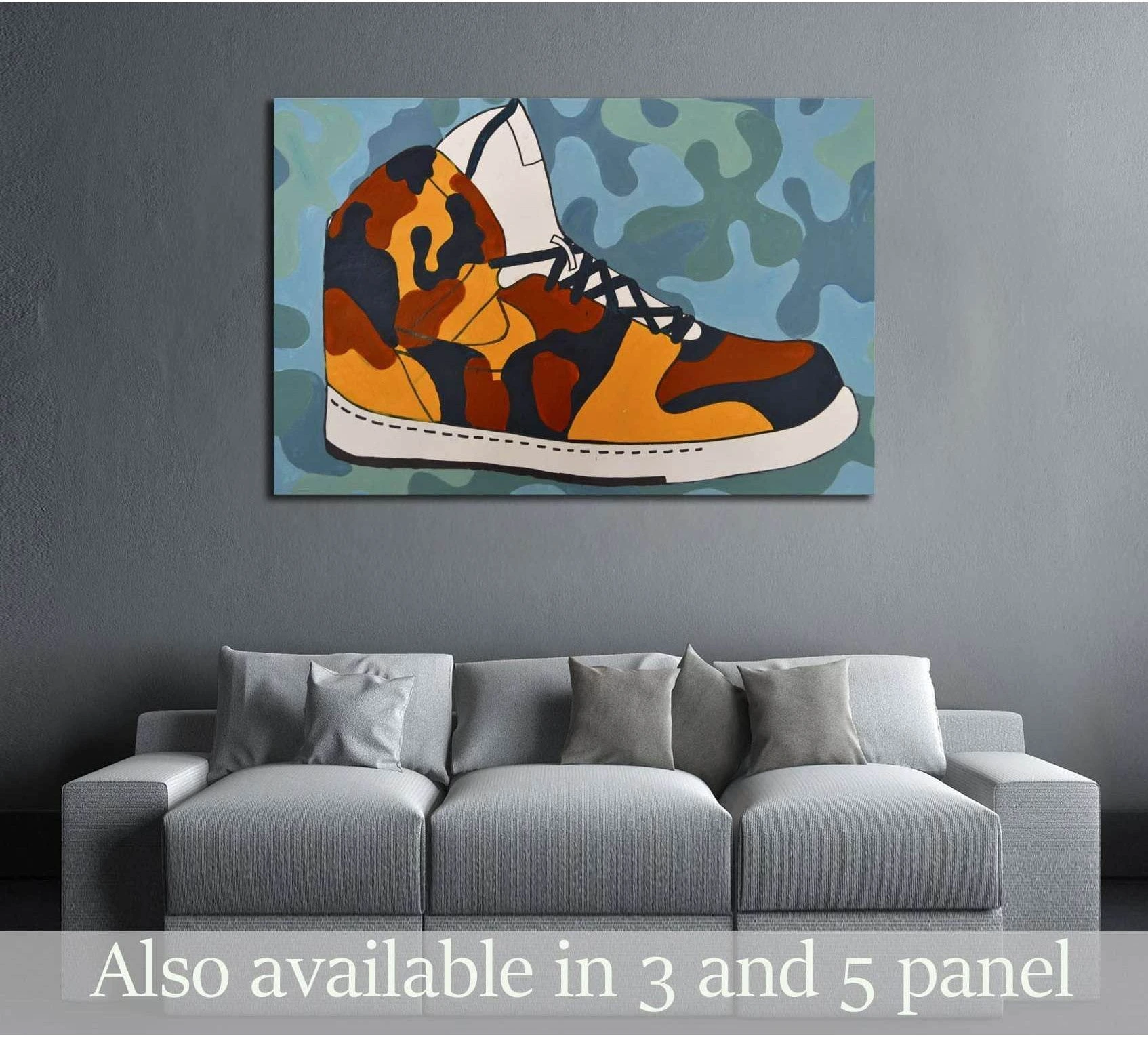 Orange camo high-top sneaker pop art canvas print hung above a gray sofa in a modern living room
