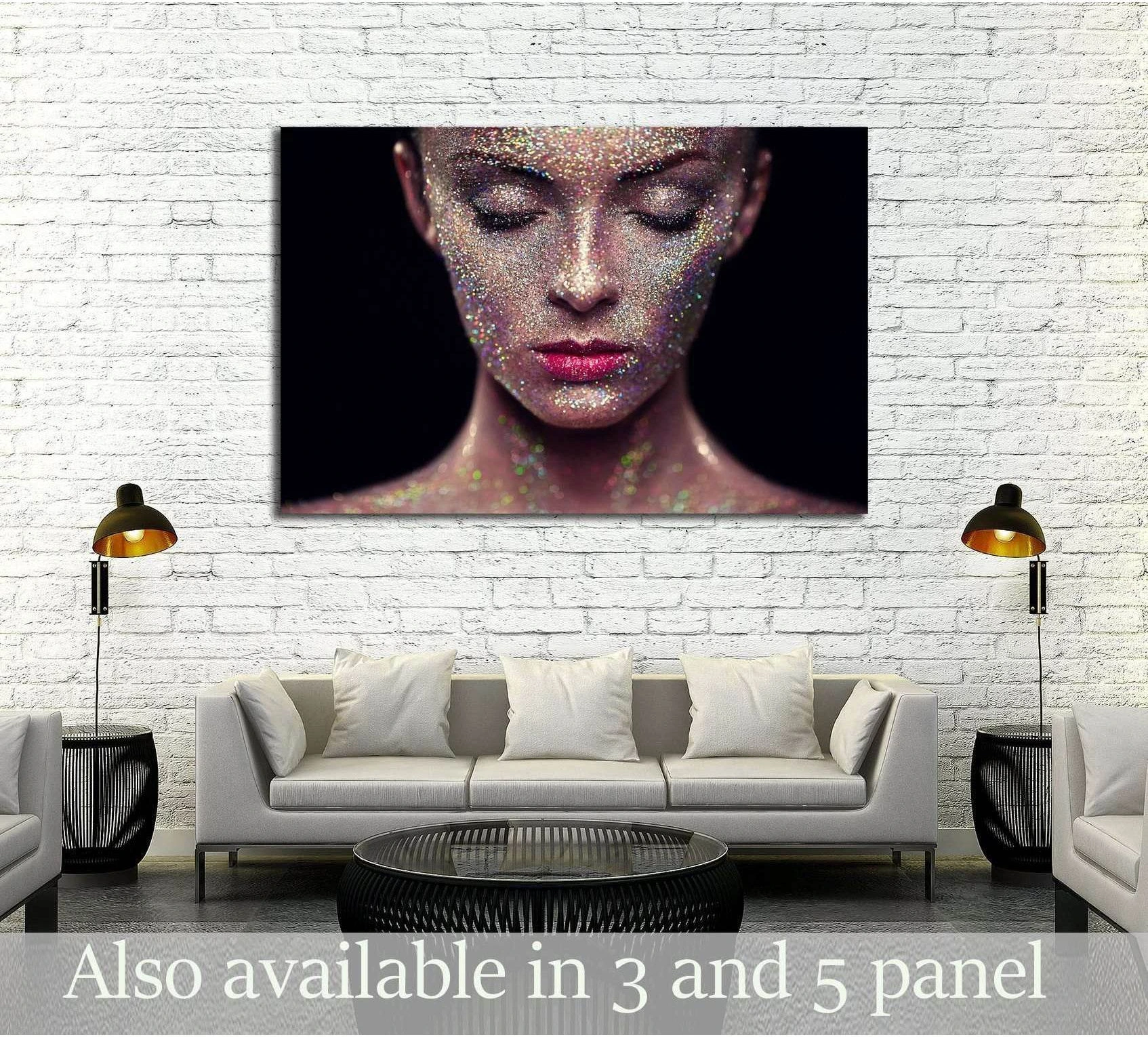 Glitter beauty portrait canvas print hung above sofa in a modern living room with white brick wall