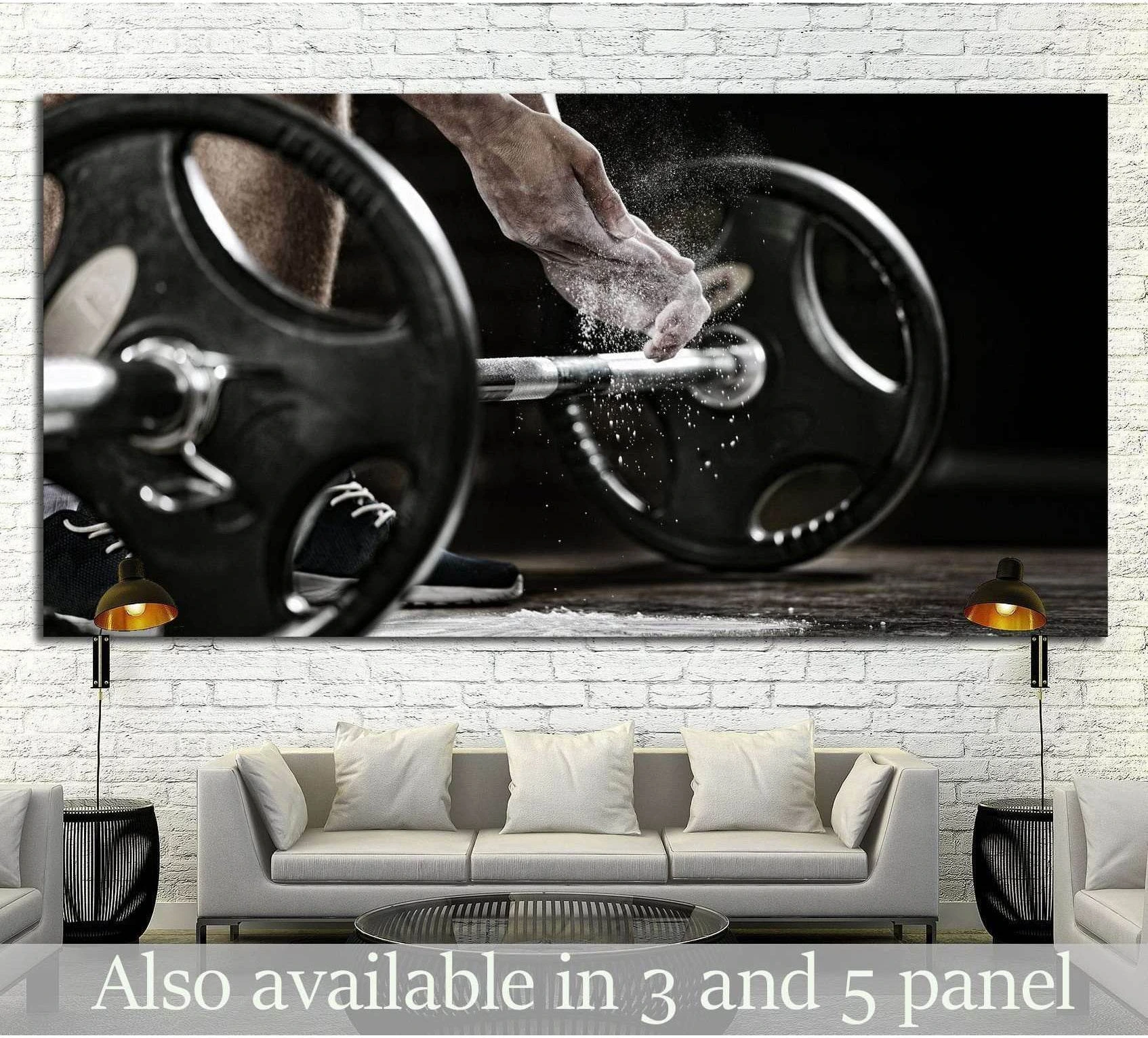 Chalked hand over loaded barbell black and white canvas print displayed above sofa in modern room