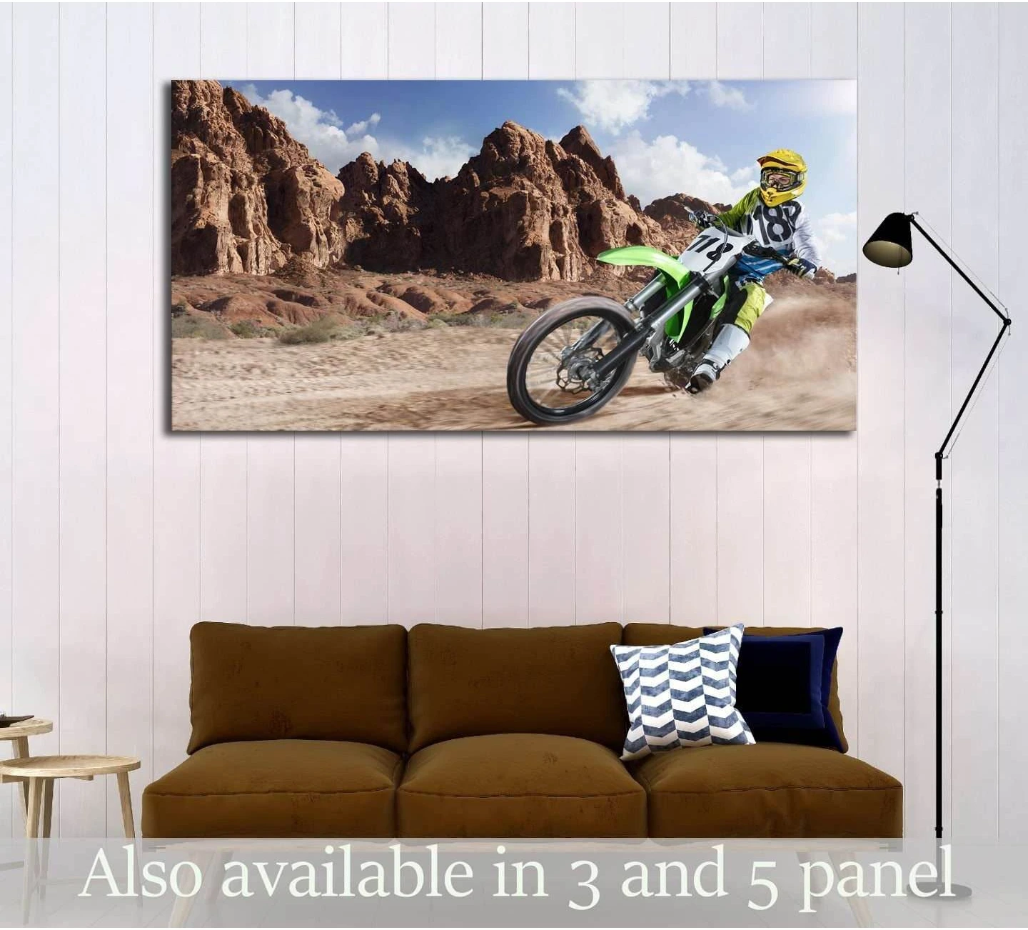 Desert dirt bike canvas print with motocross rider kicking up dust near rocky canyon cliffs