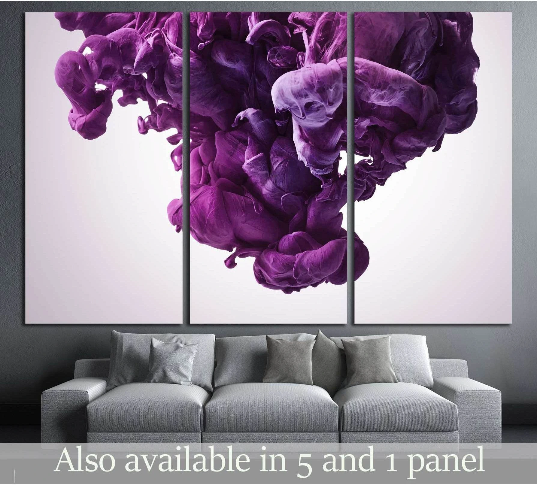 Purple abstract canvas print with swirling ink cloud on white background above a gray sofa