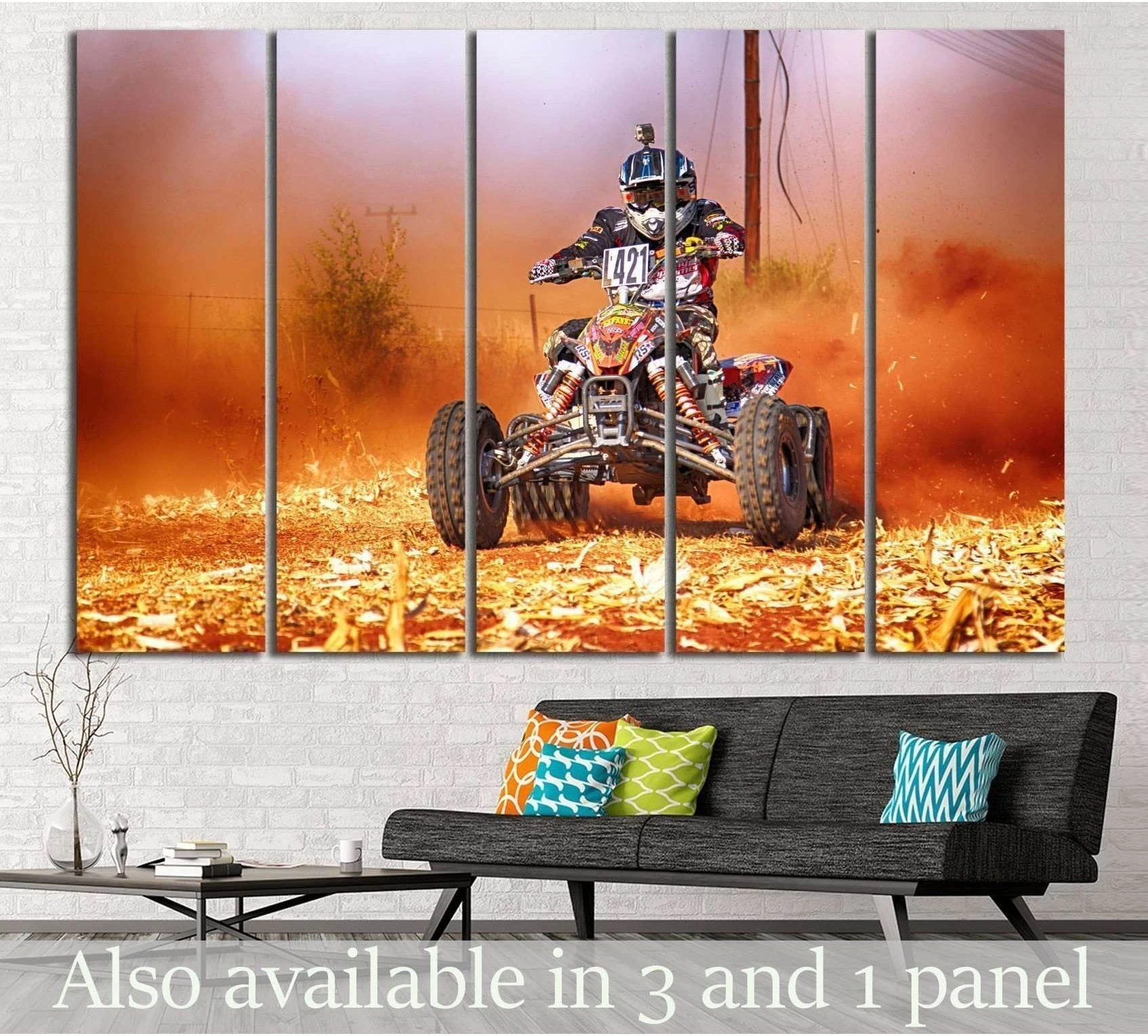 Quad biker canvas print with ATV rider charging through orange dust above a sofa