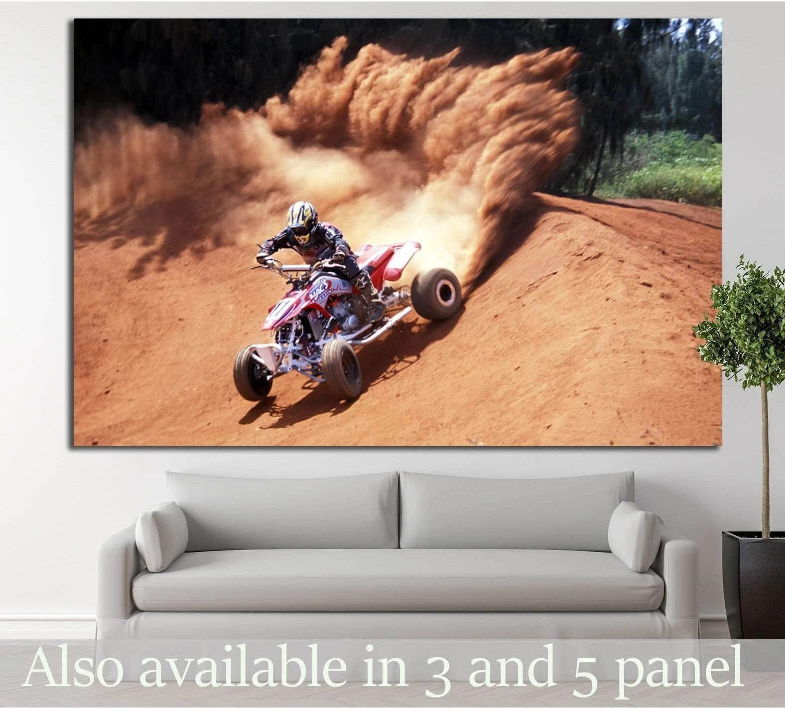 Quad biker canvas print with ATV rider sliding through red dirt on an off-road track