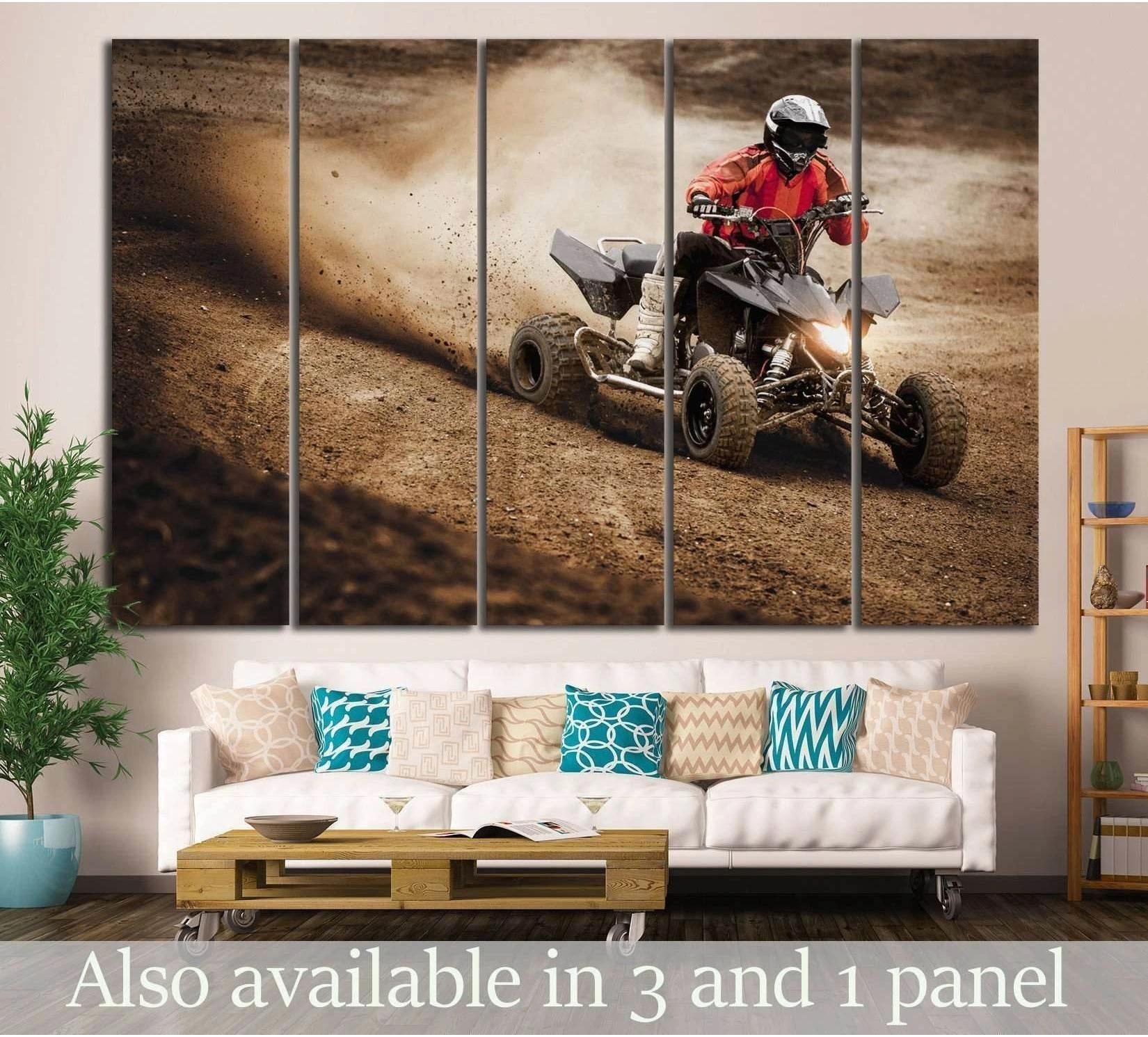 ATV quad bike canvas print showing a rider drifting through dusty dirt, displayed above a sofa