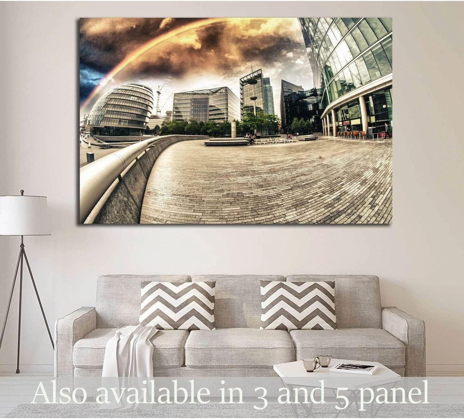 Rainbow over modern city skyline canvas print displayed above sofa in a neutral living room