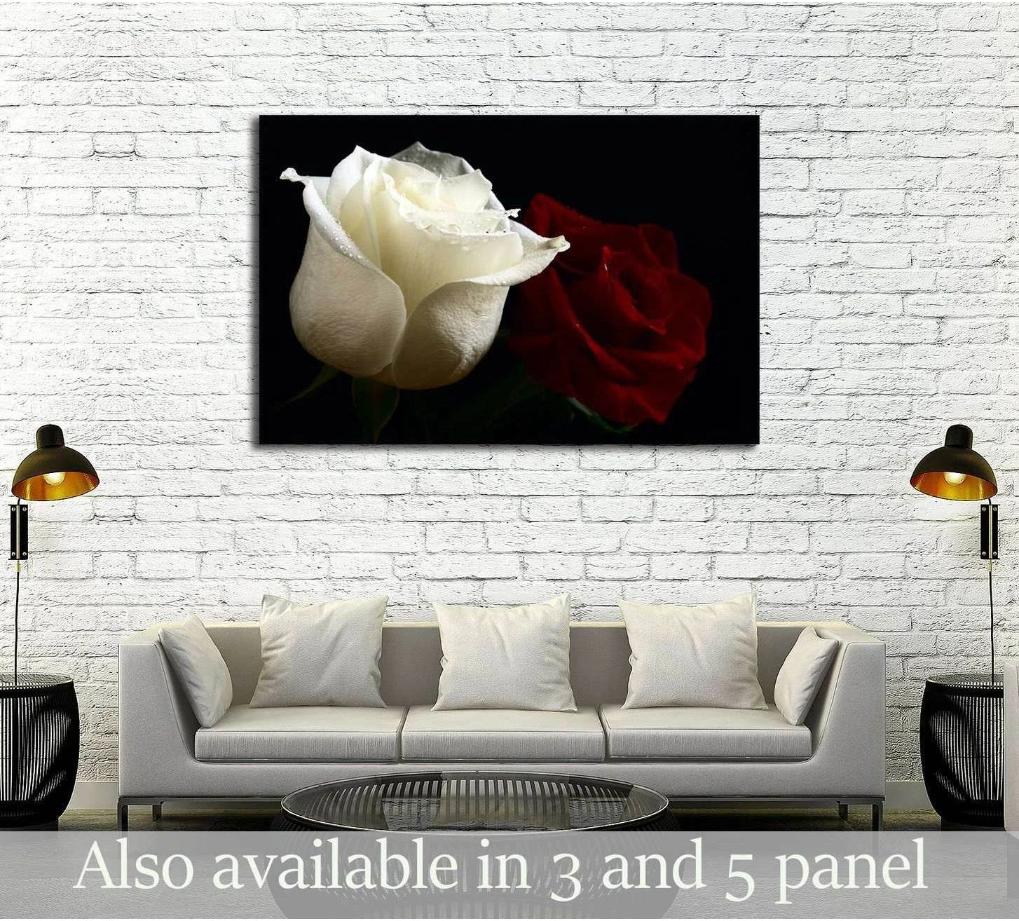 Red and white rose canvas print with water droplets on black background above a sofa