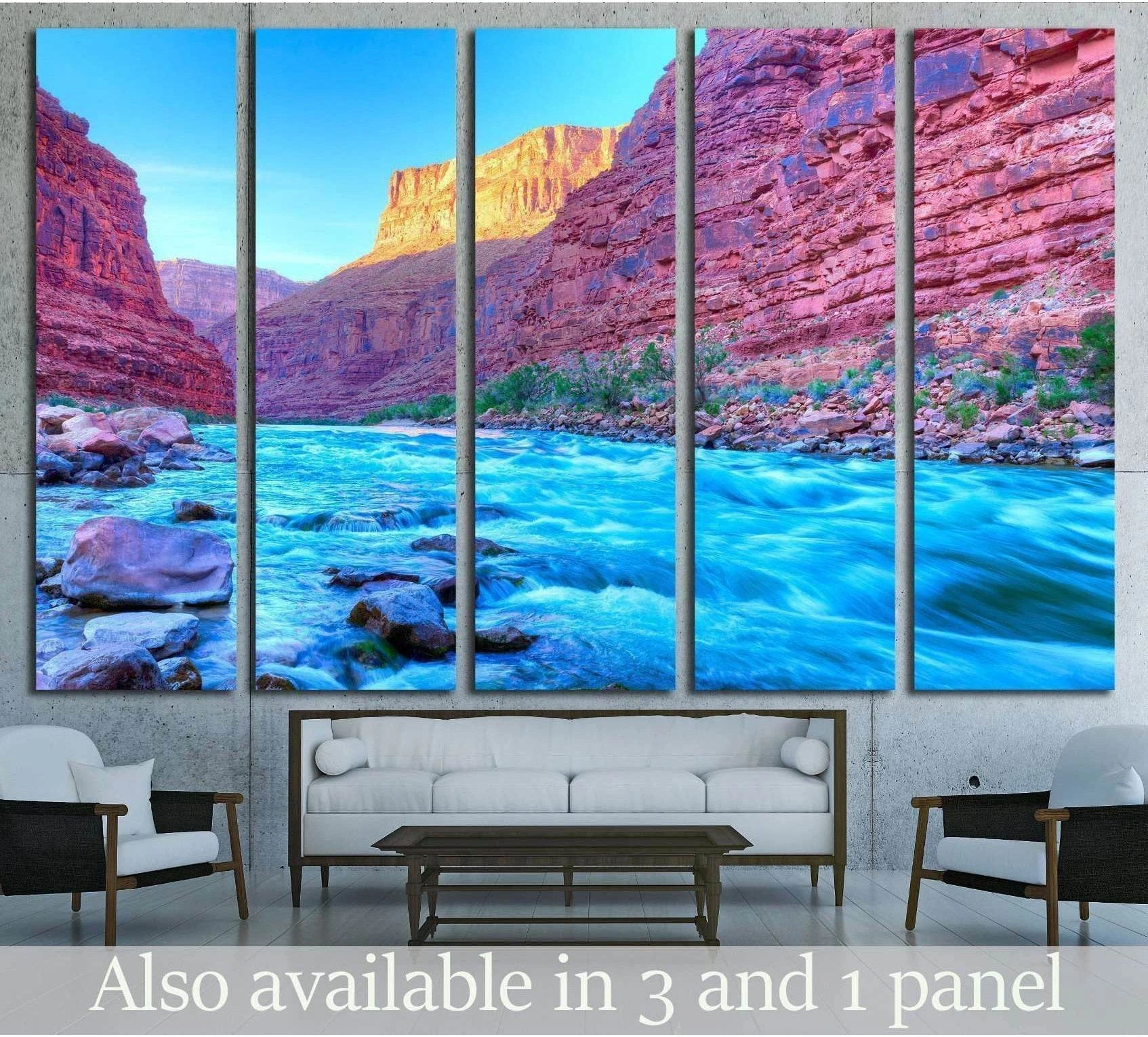 Grand Canyon canvas print with bright blue Colorado River and red canyon walls above sofa