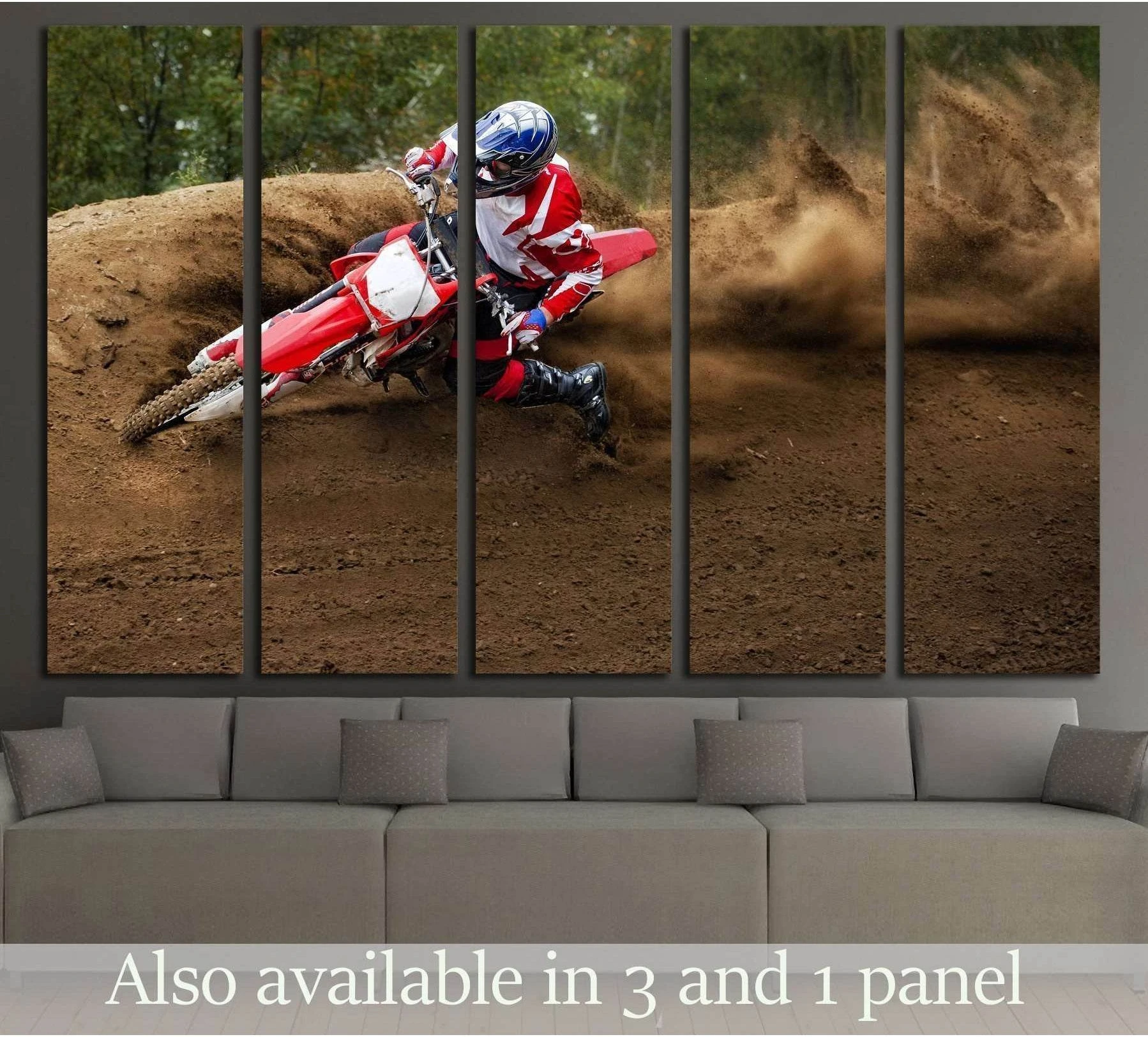 Motocross canvas print of a red dirt bike rider sliding through a dusty turn, hung above a sofa