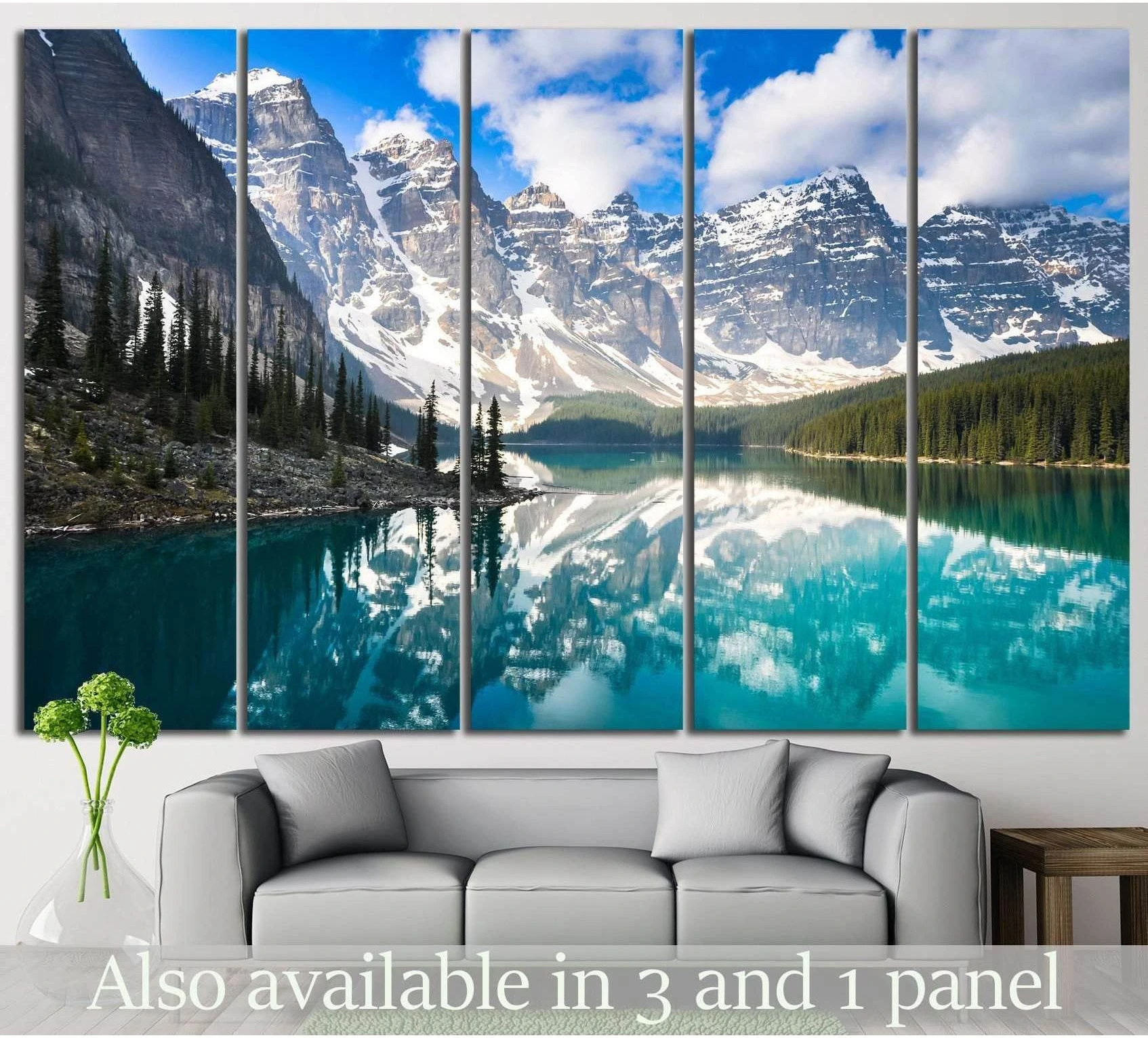 Moraine Lake canvas print with turquoise water and snowy Canadian Rockies above a sofa