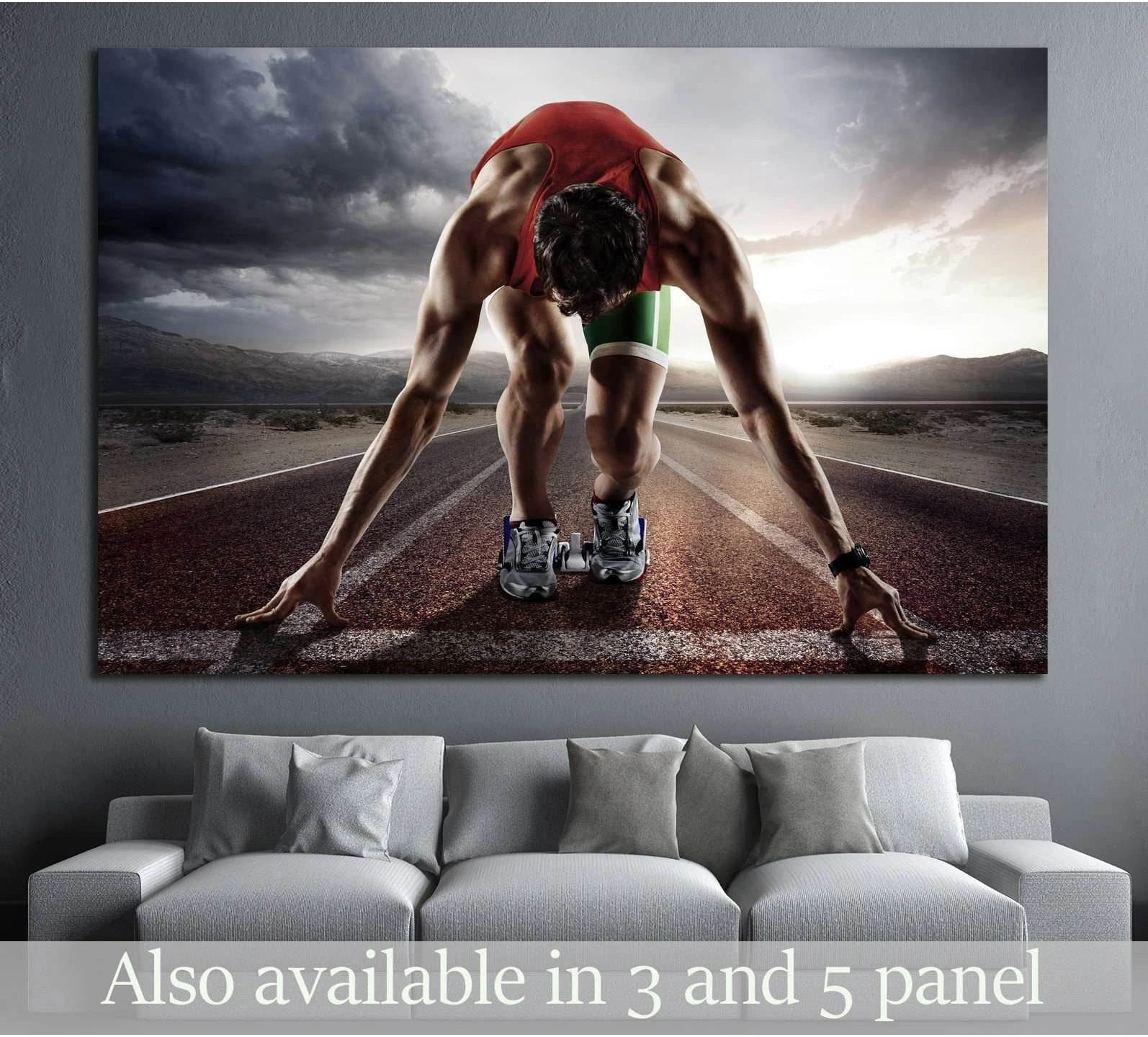Track runner canvas print with sprinter at starting line under dramatic sky above sofa