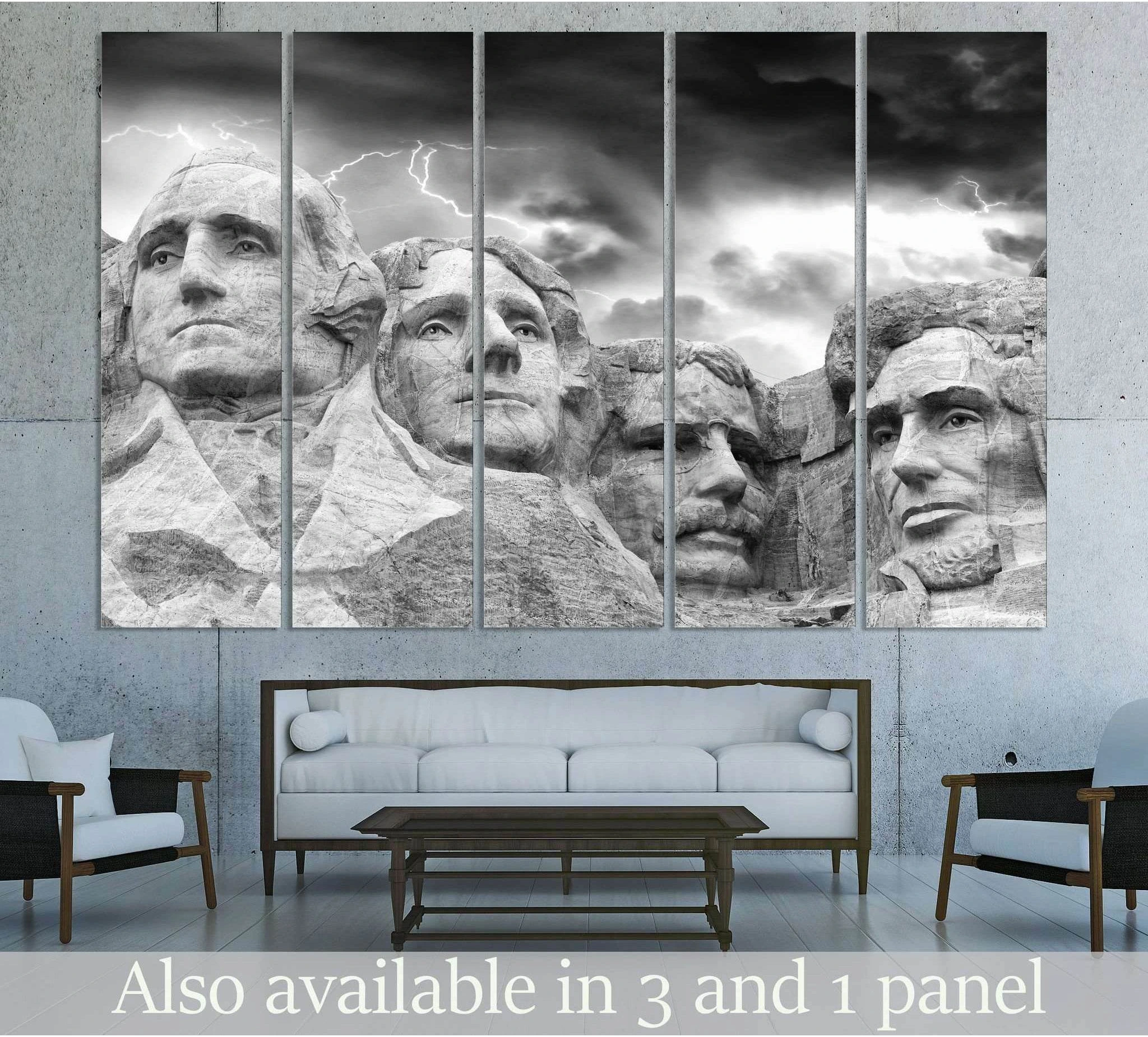 Black and white Mount Rushmore canvas print with lightning sky above sofa in modern living room