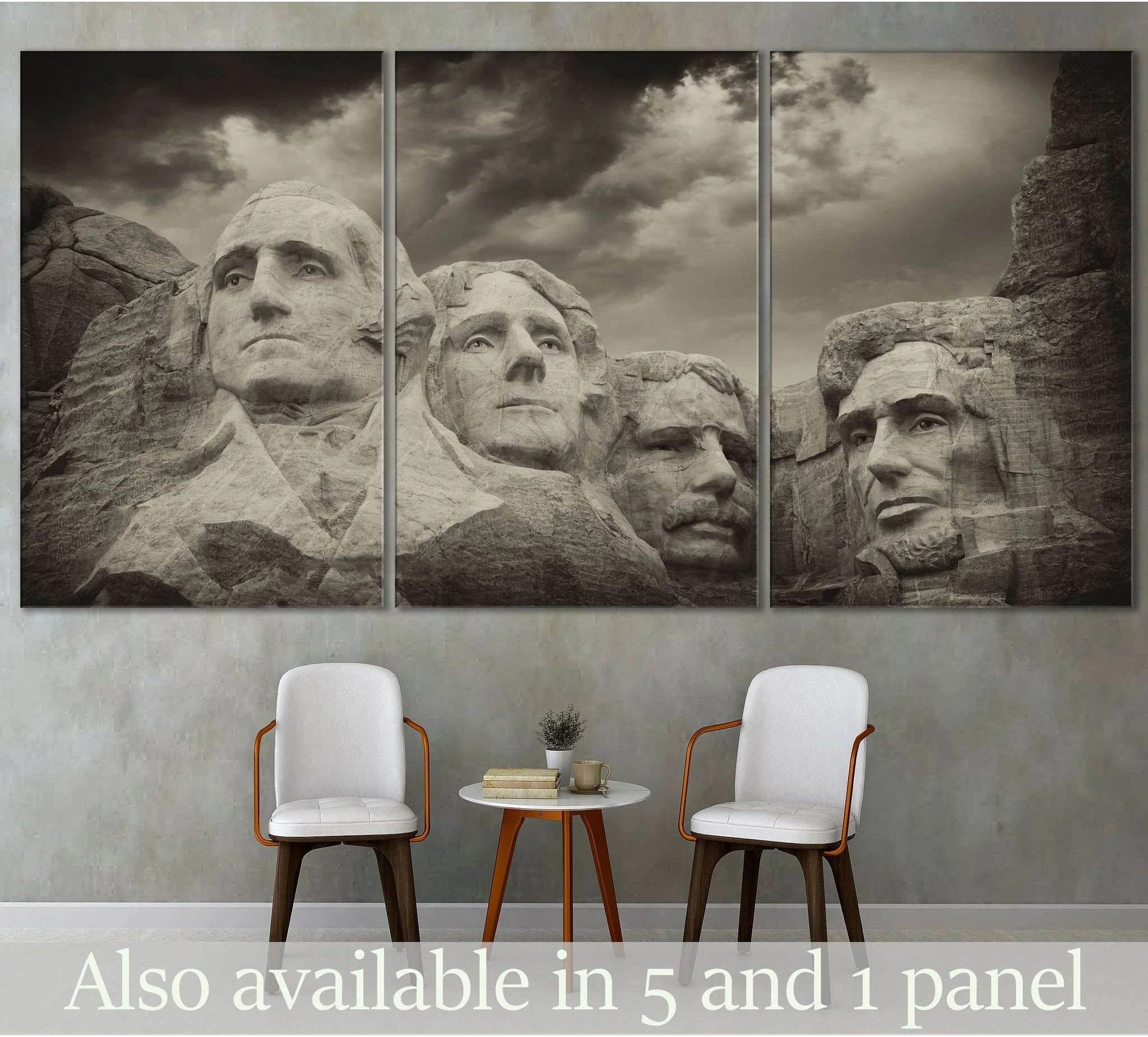 Sepia Mount Rushmore triptych canvas print above chairs in a neutral office or study setting