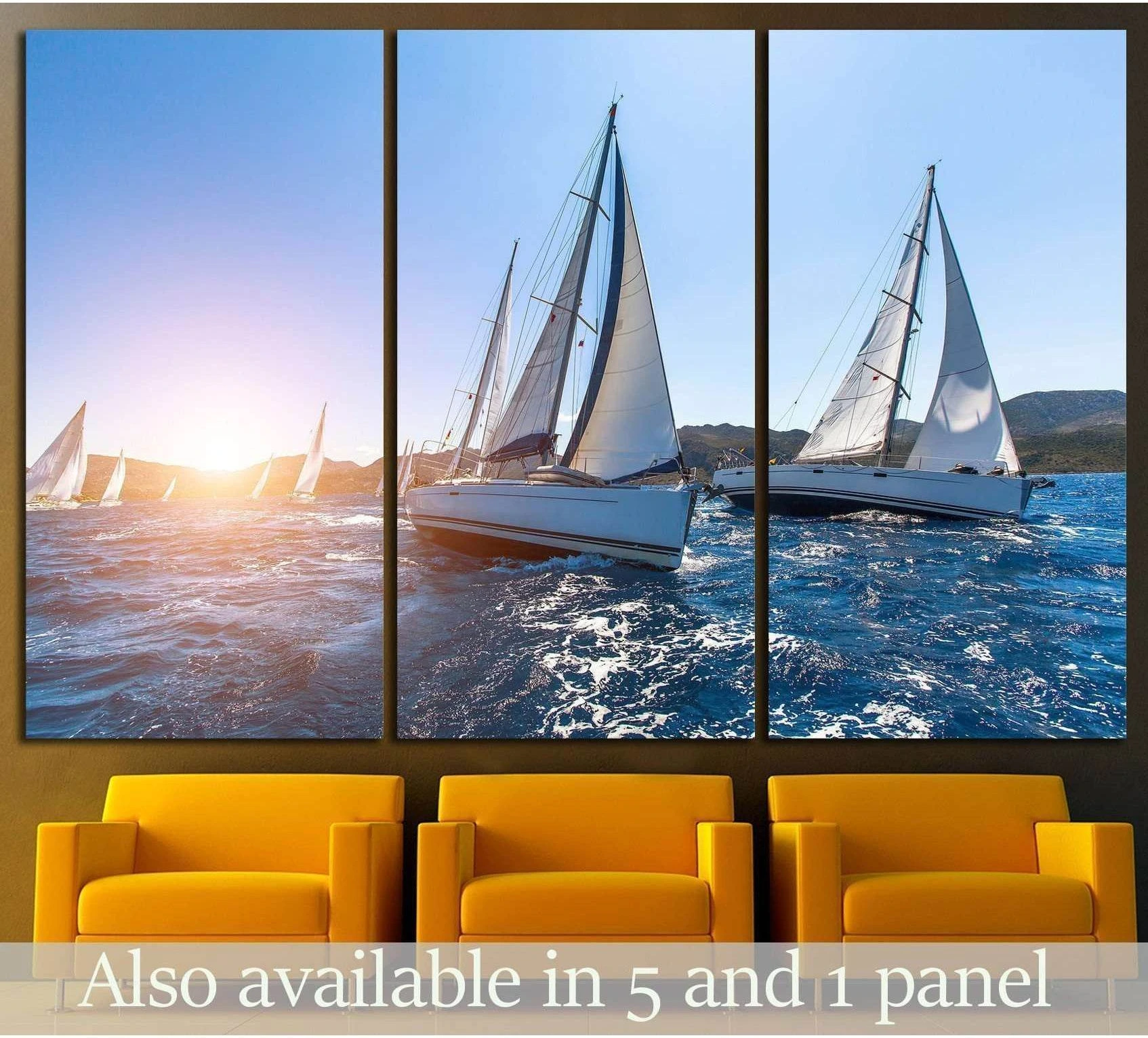 Sailboat canvas print of white yachts racing through blue ocean water at sunset, shown as a triptych above mustard chairs