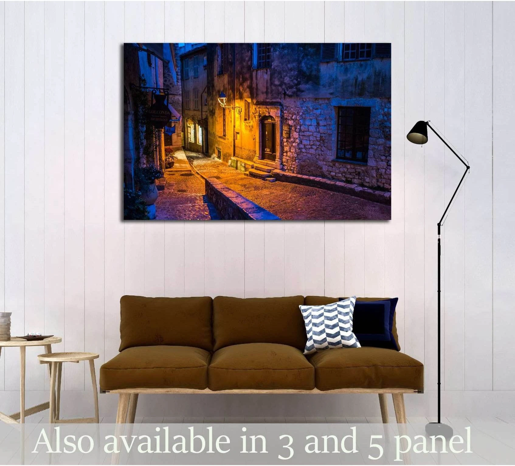 Saint-Paul-de-Vence night street canvas print above sofa in a modern living room
