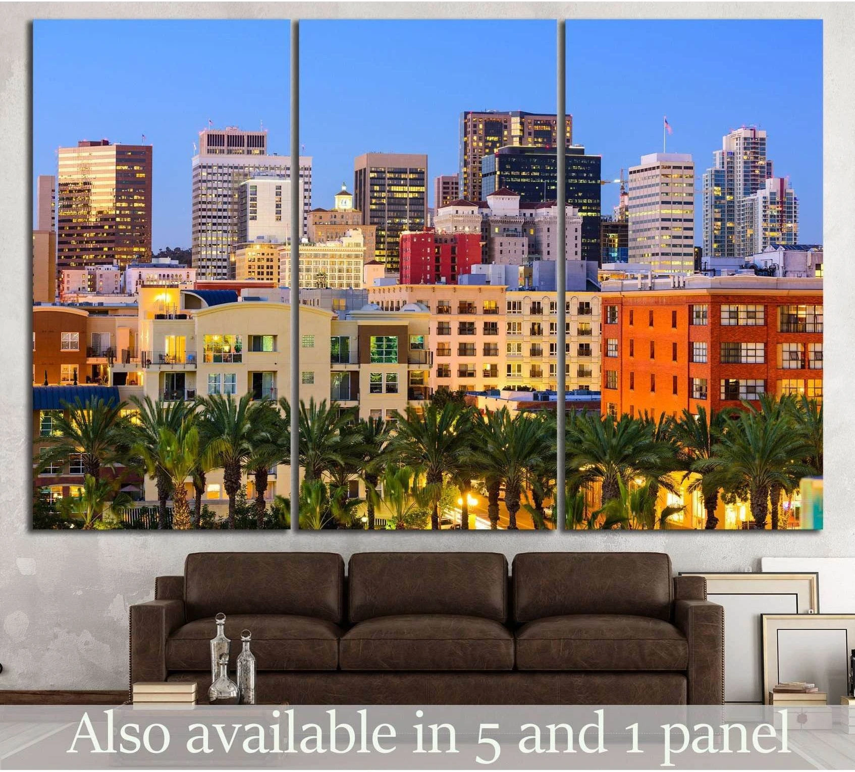 San Diego skyline canvas print with palm trees at dusk displayed above a brown sofa